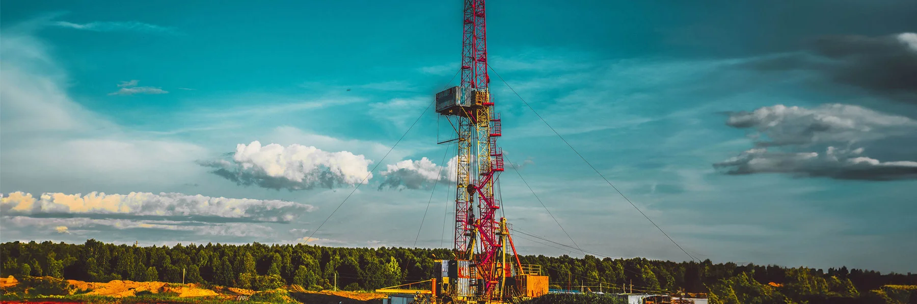 Land oil drilling rig blue sky