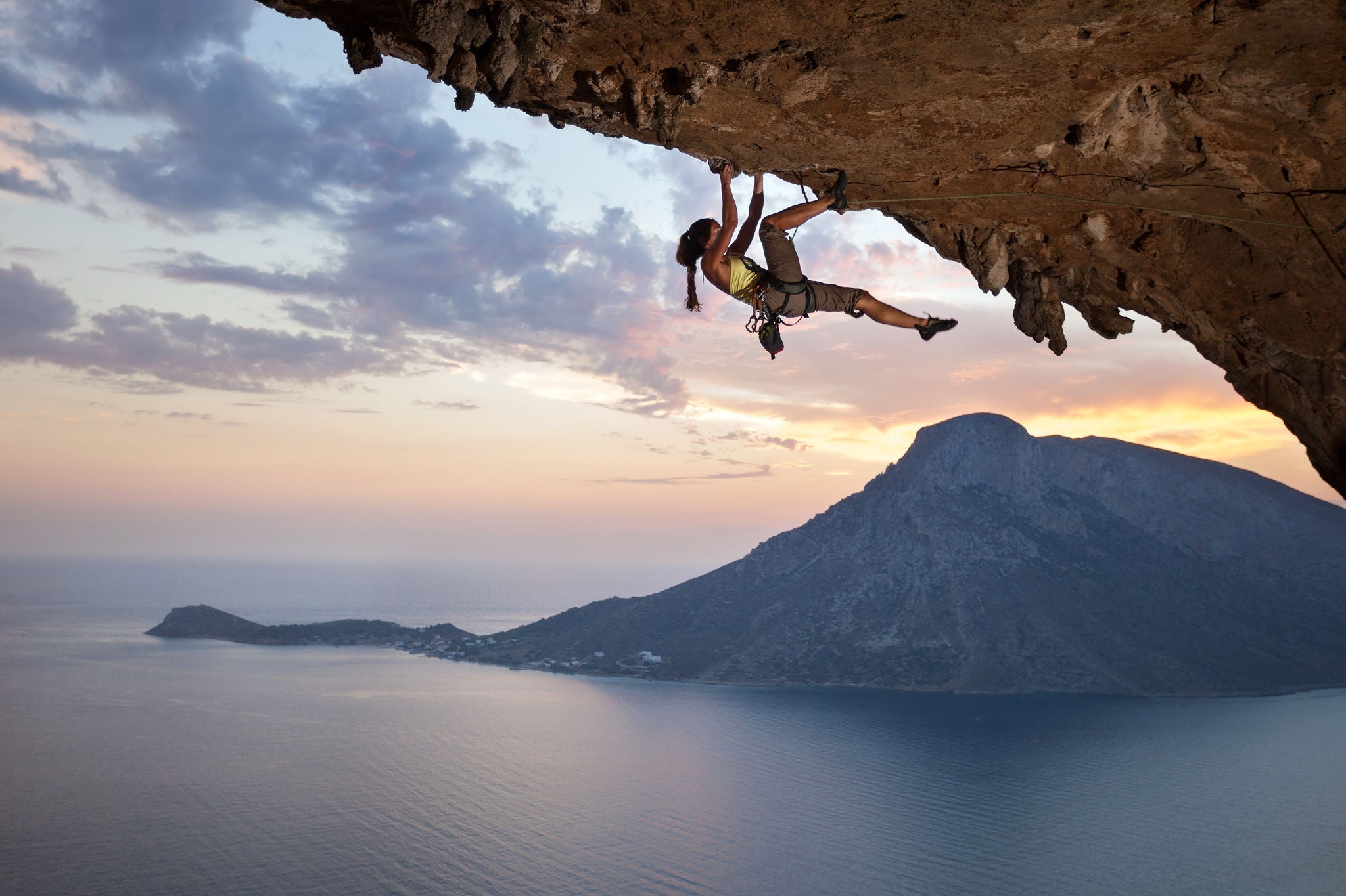 Picture of woman climbing a mountain