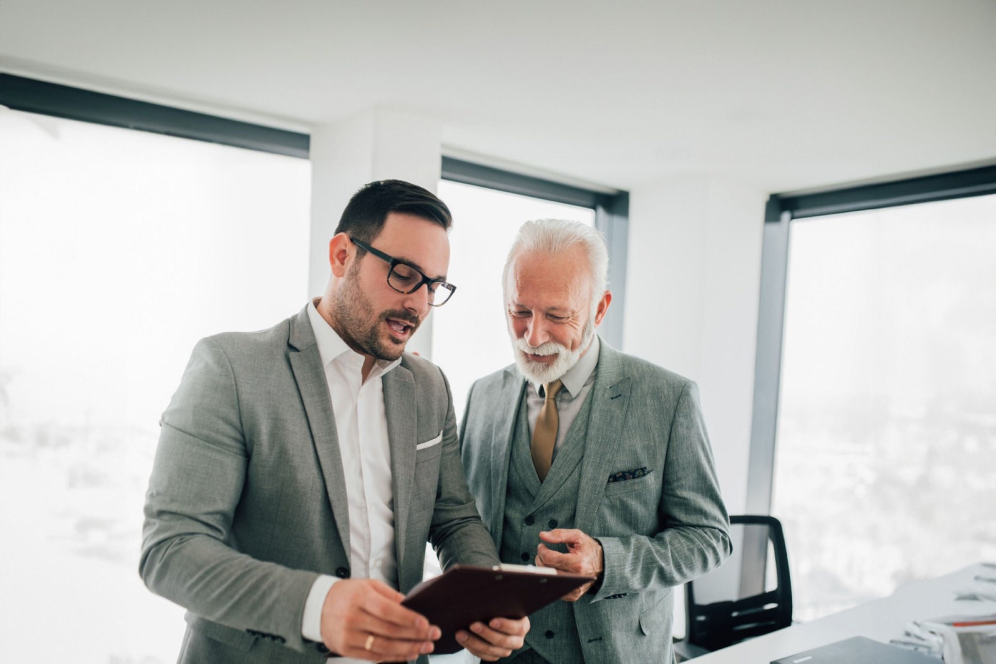 Two men from different generations working together