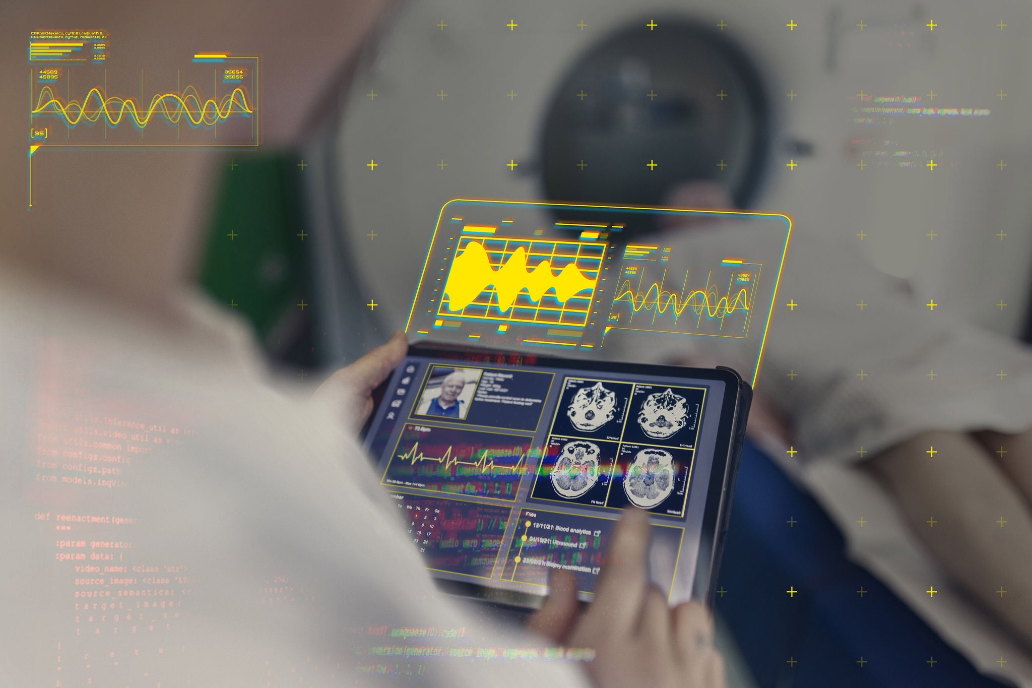 Over the shoulder view of a female doctor looking at brain x-ray images of male patient undergoing MRI in background at hospital. Neurologist examining patient's CAT scan images on digital table in clinic.