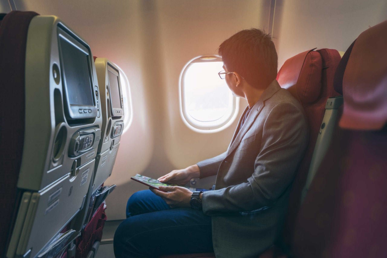 Man sitting on a plane