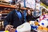 Two volunteer sorting food