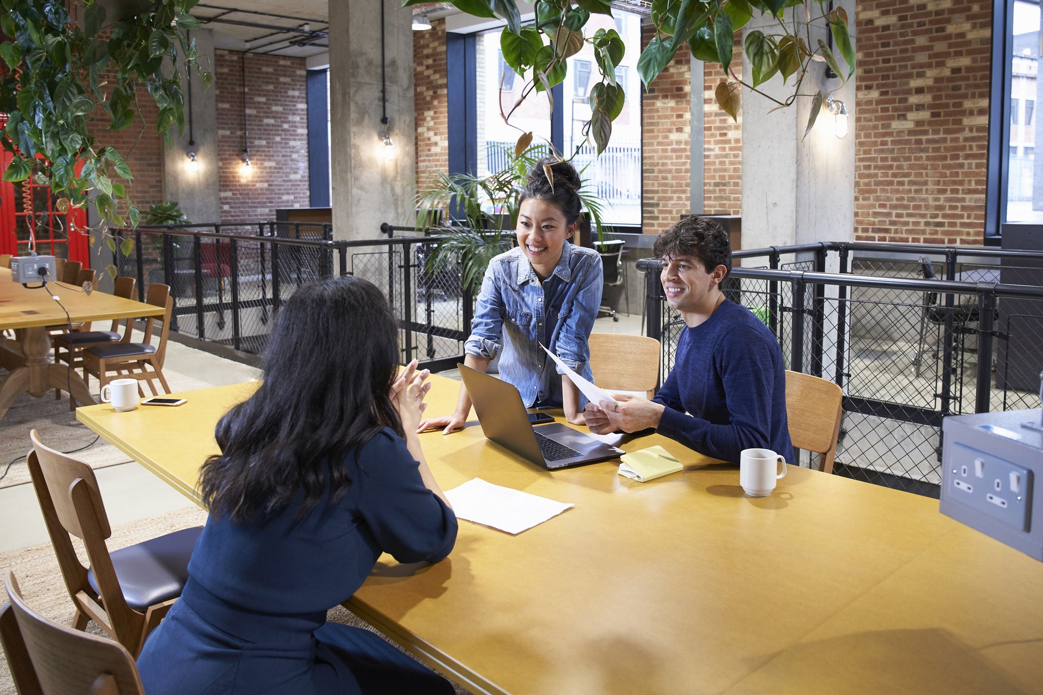 Three-employees-working-on-a-project