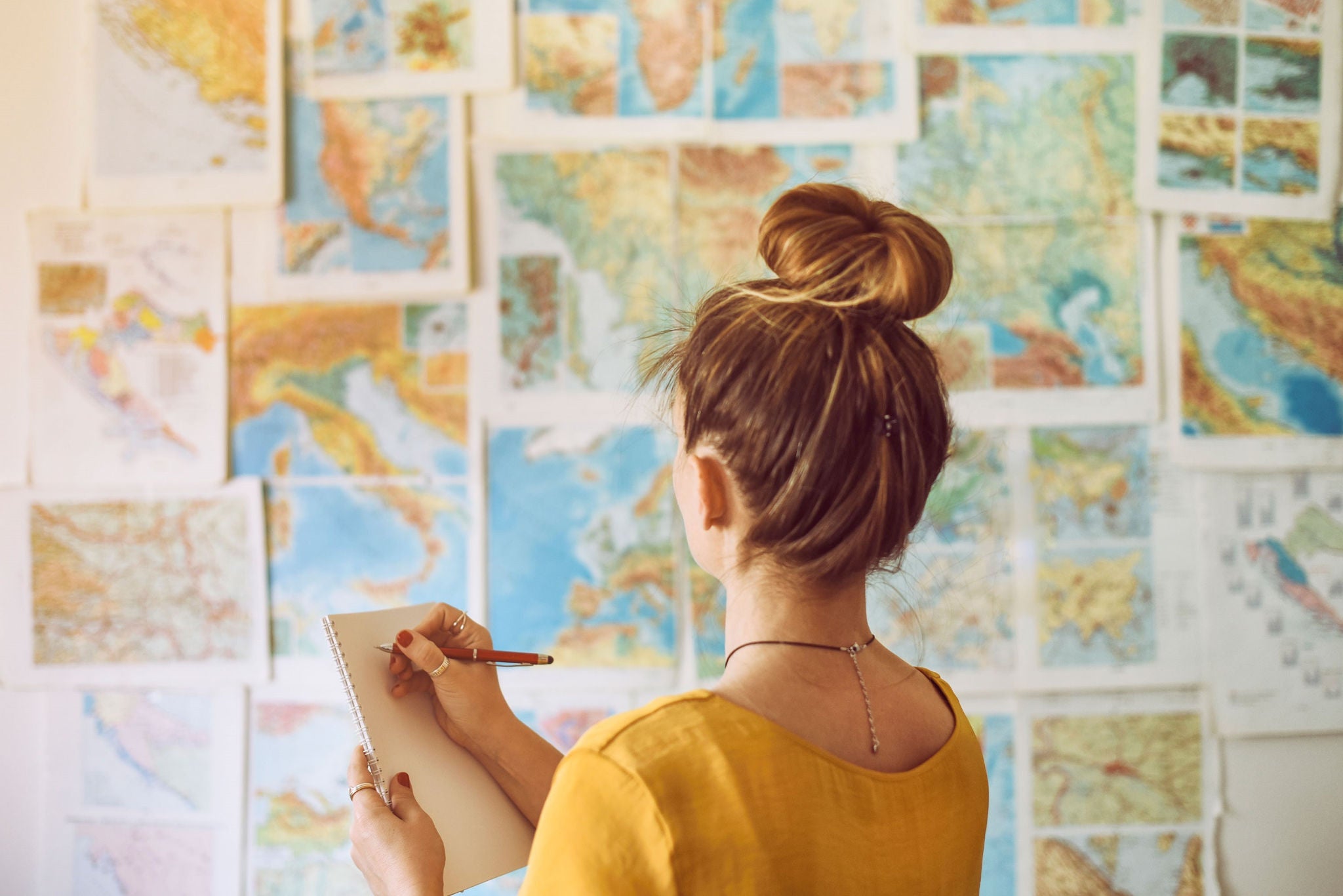 women looking at maps