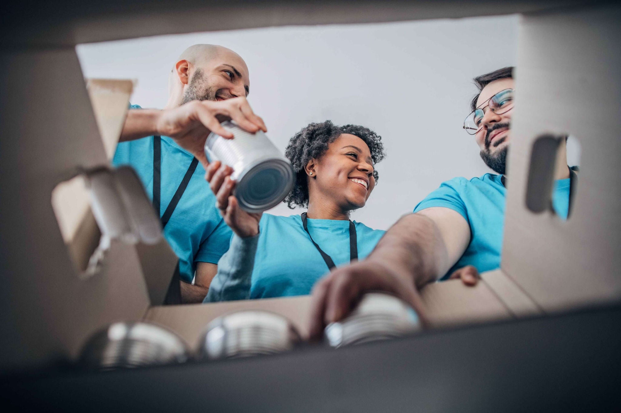 EY - People packing a box