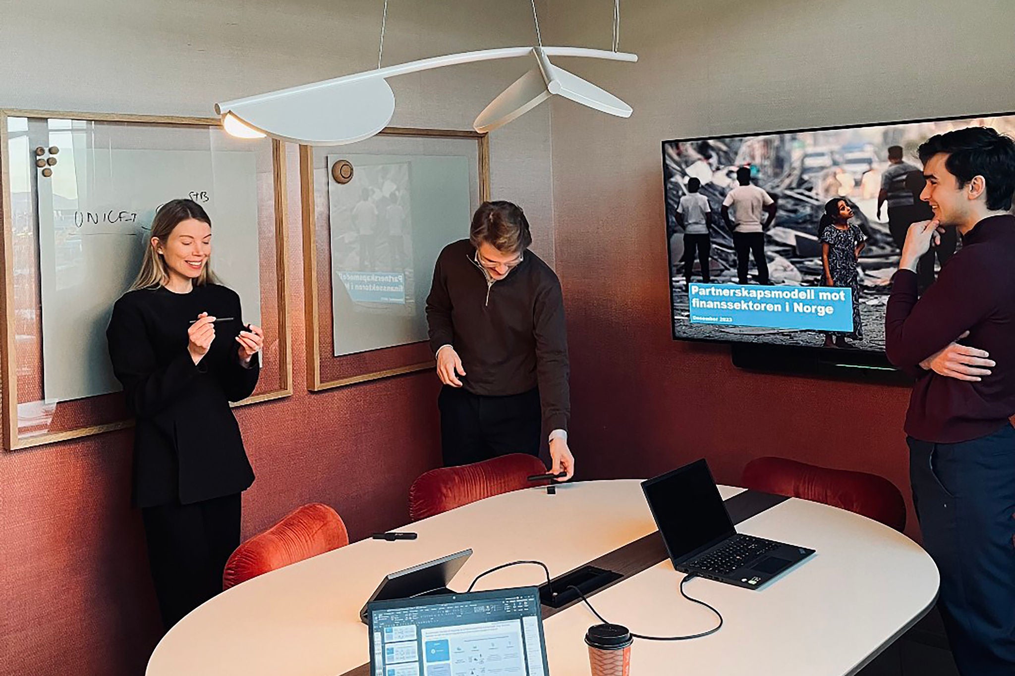 Members of the Norwegian EY Financial Team and the UNICEF team gathered in a meeting room