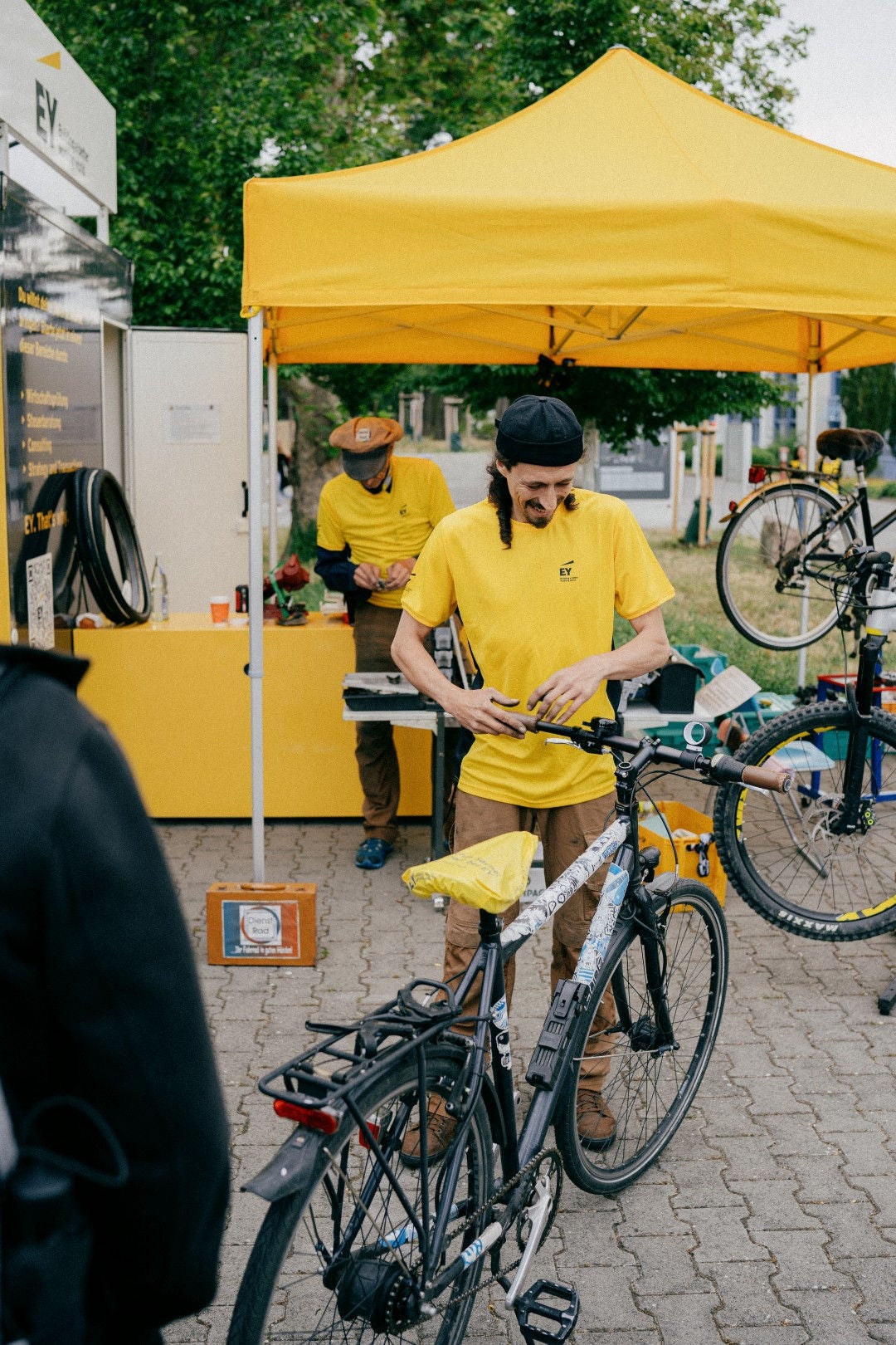 A man checking bicycling skills on wheels