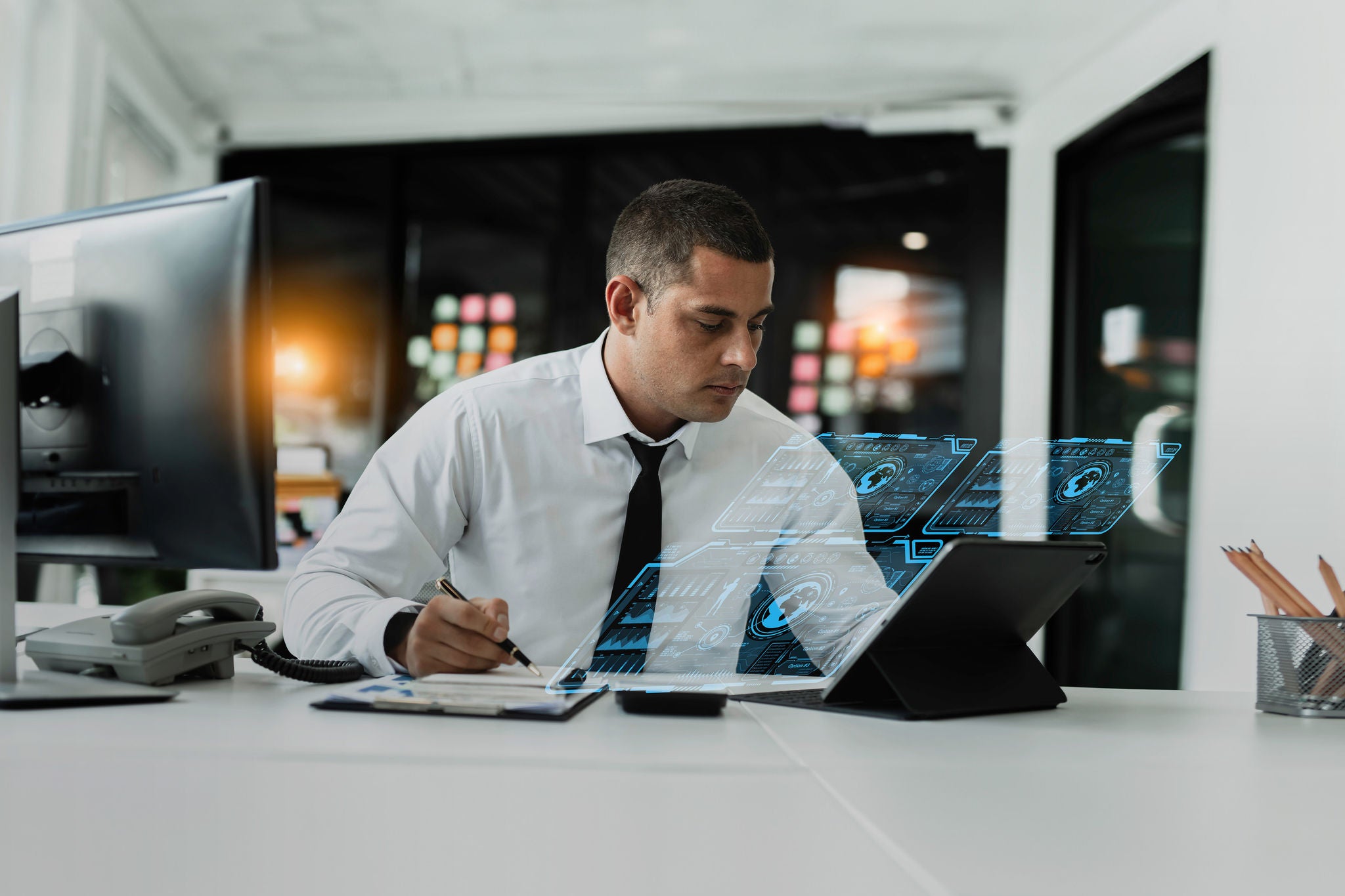 Business man working on digital laptop computer