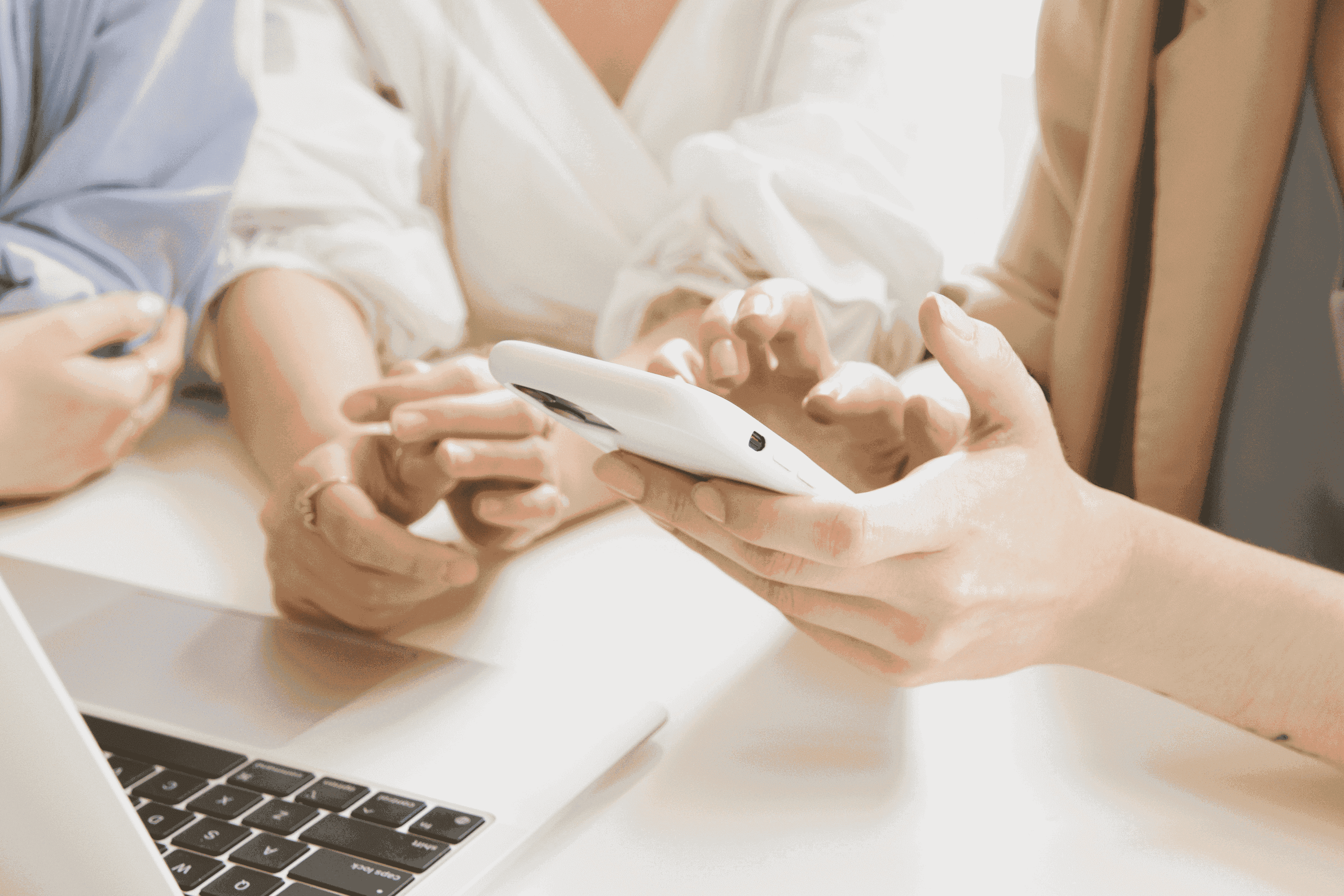 Women working with laptop and phone