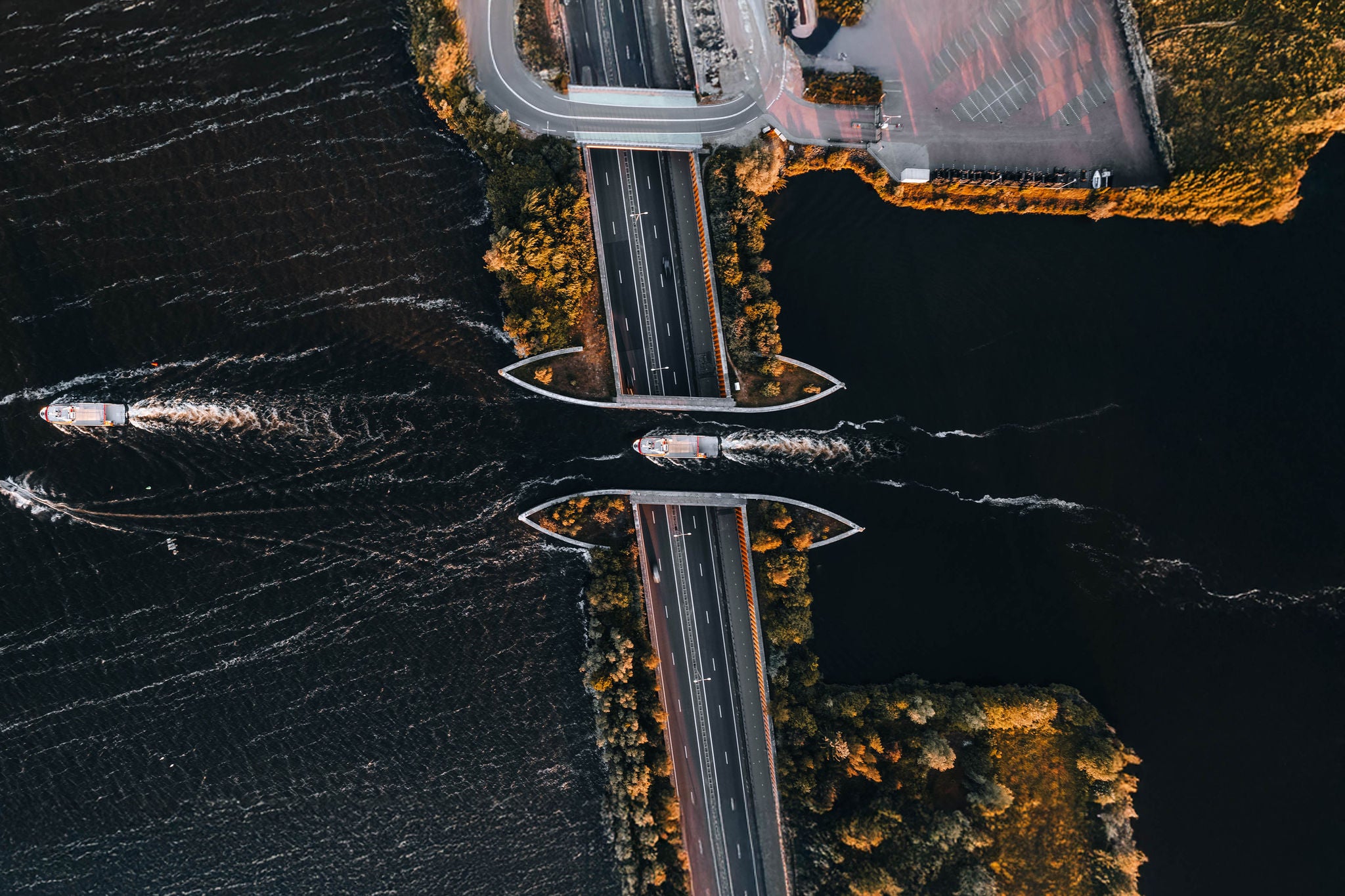 Aerial view of boat crossing aquaduct in Harderwijk, Veluwemeer The Netherlands. High quality 4k footage