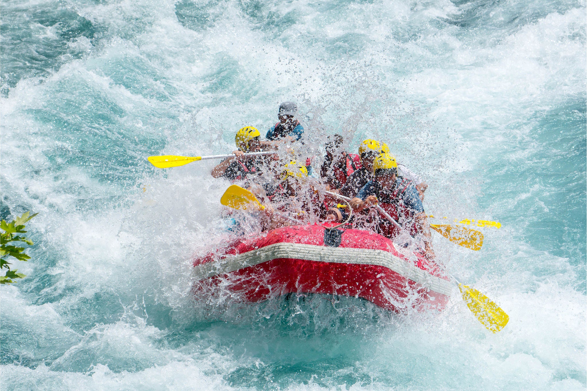 People rafting in the ocean