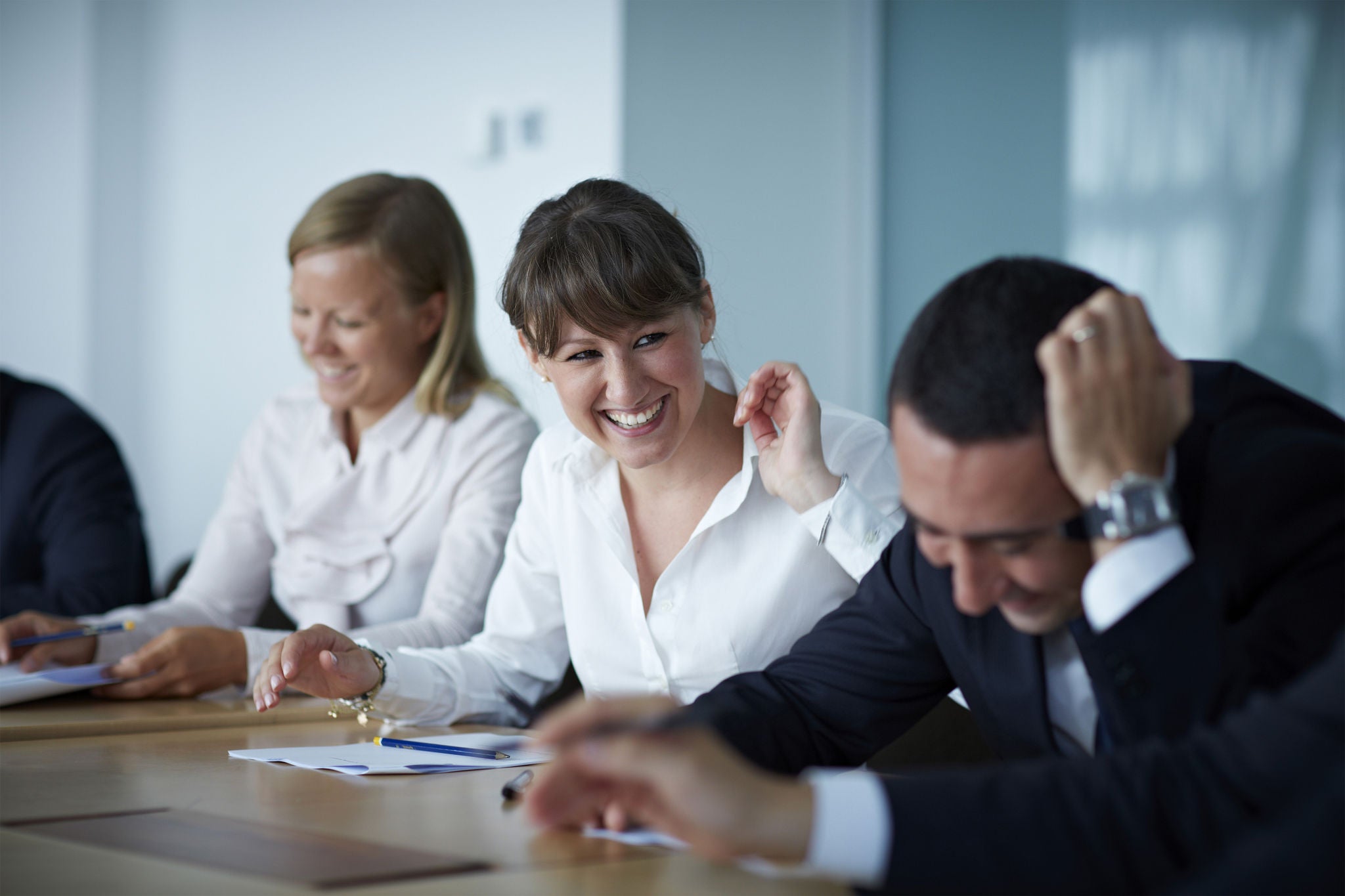 Corporate employees discussing