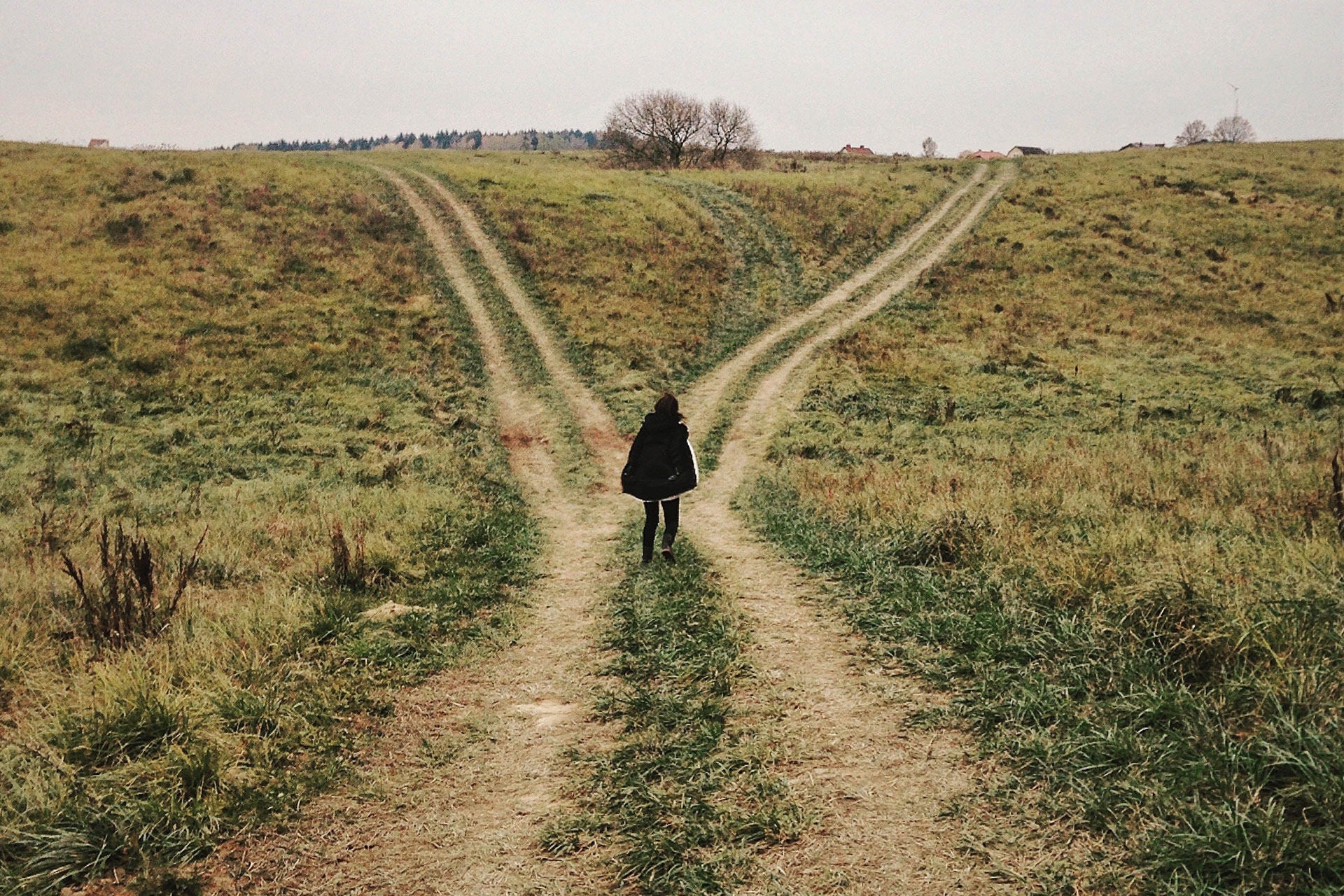 ey-woman-standing-at-a-crossroads