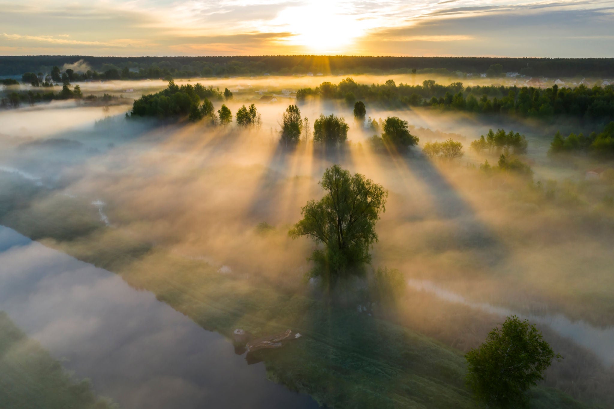 Beautiful misty dawn in the spring on the river