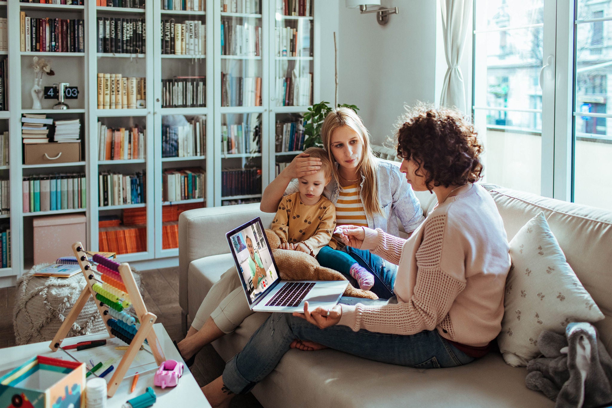 Young family on a call with their doctor