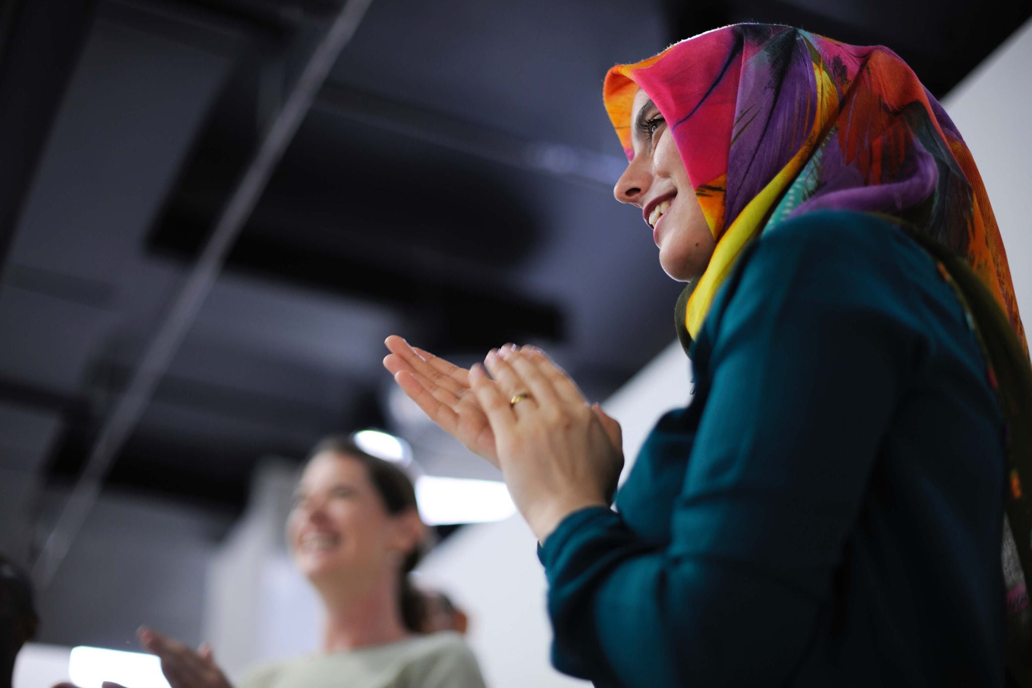 women clapping