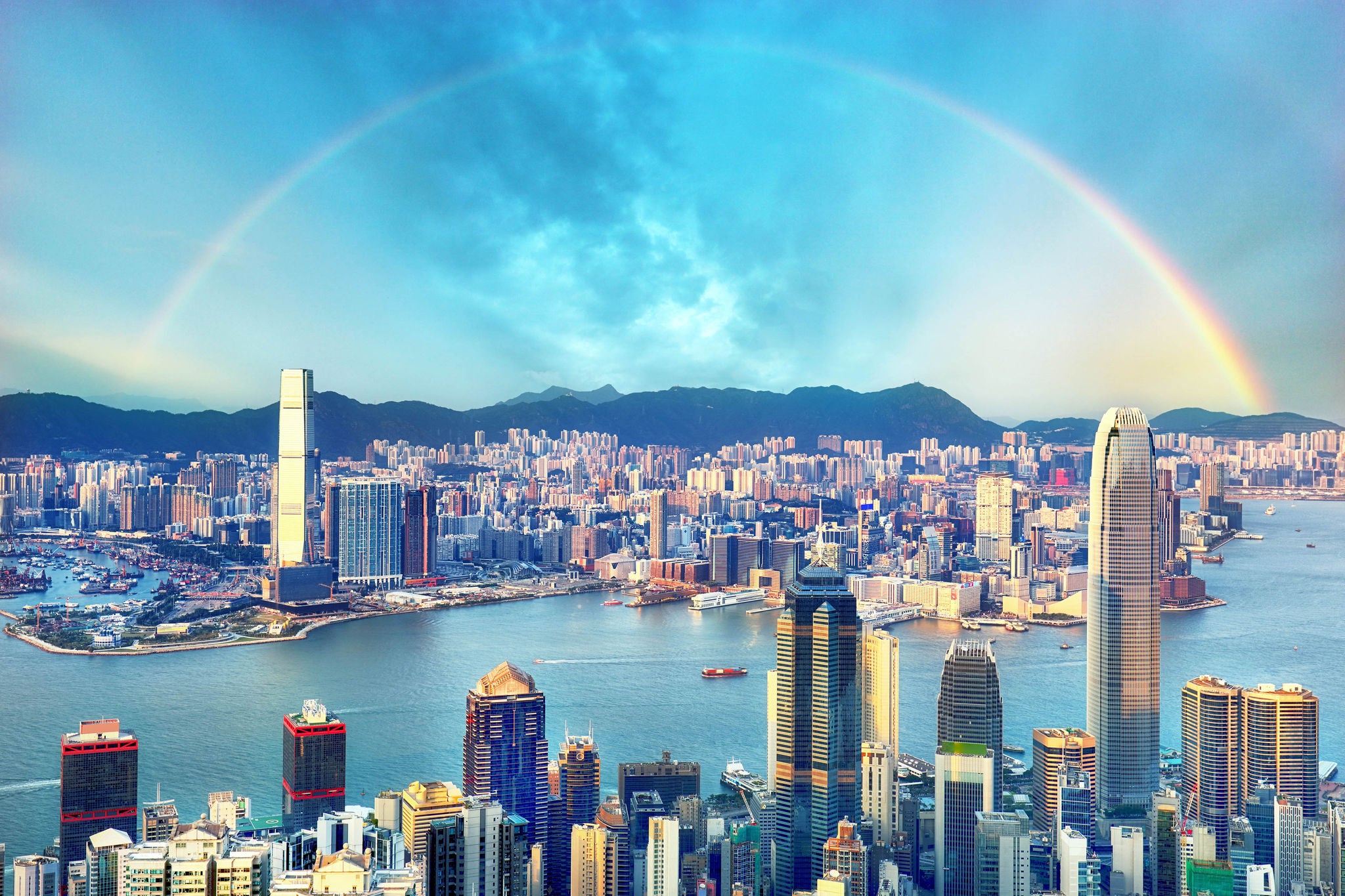 Rainbow over Hong Kong city skyline