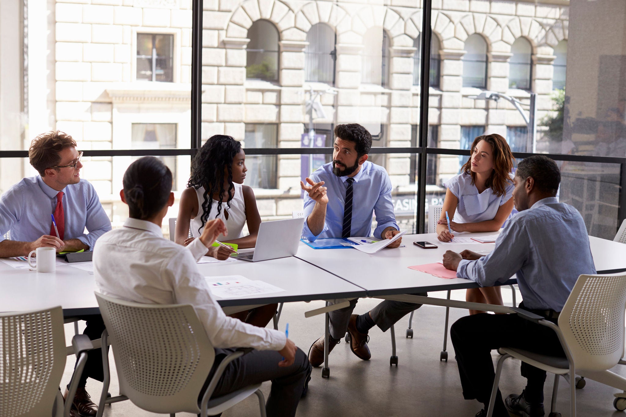 Group of business people brainstorming at a creative office