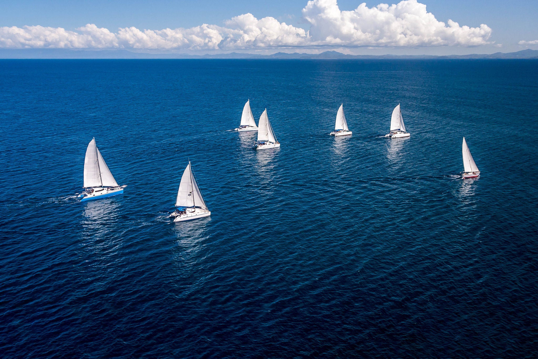 Regatta sailboat and catamaran in Mozambique Channel