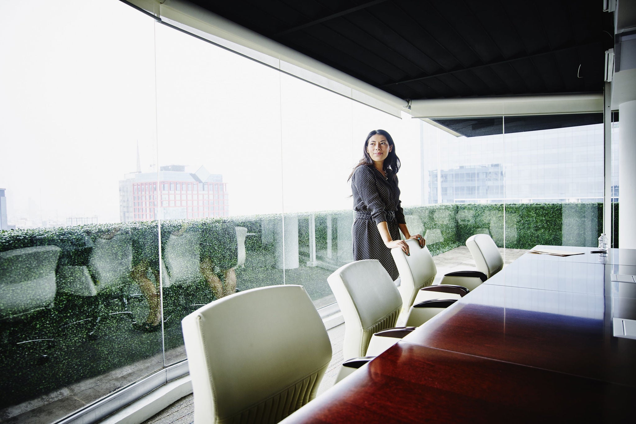 Woman standing in meeting room