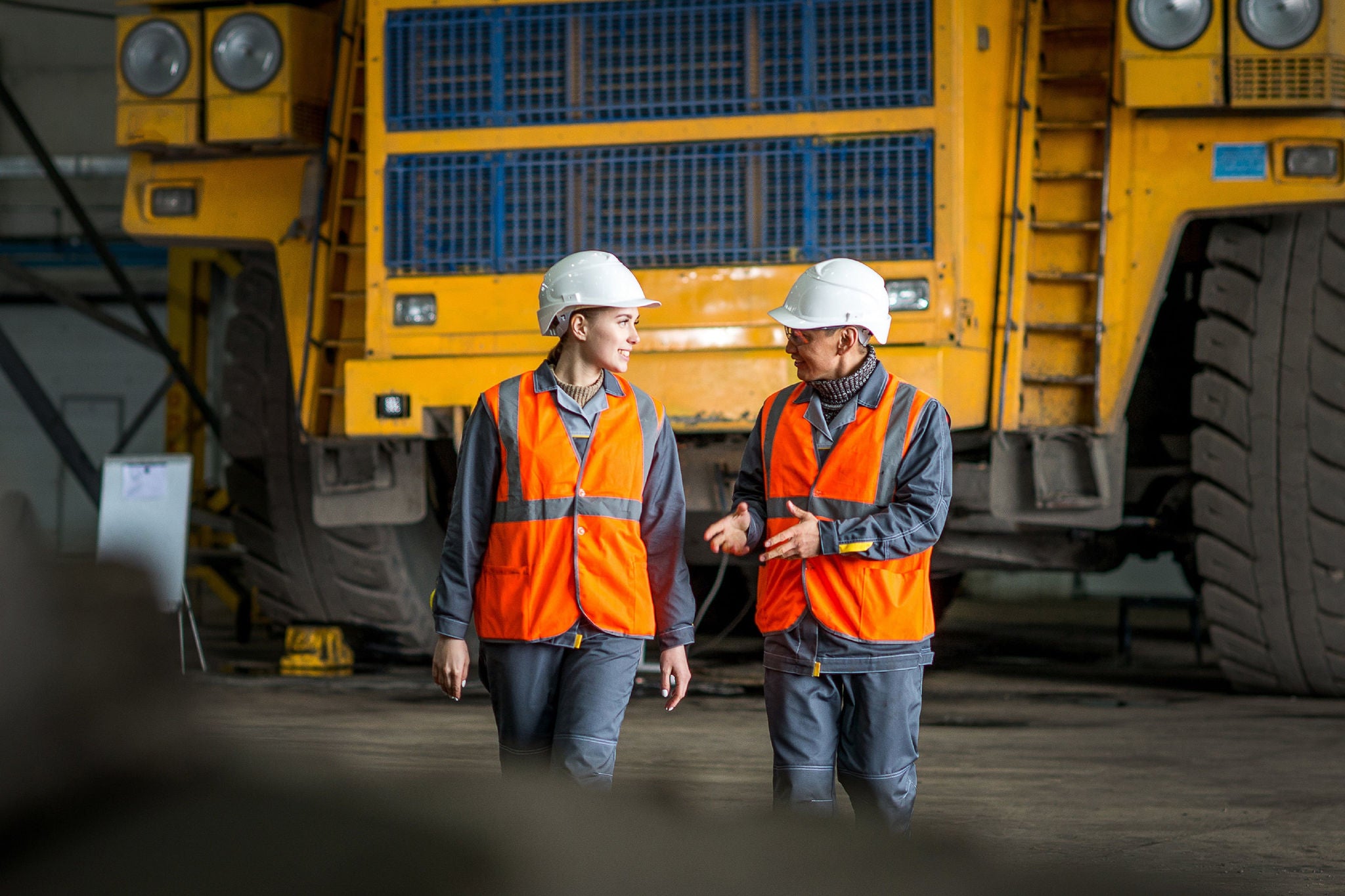 EY truck people having conversation.