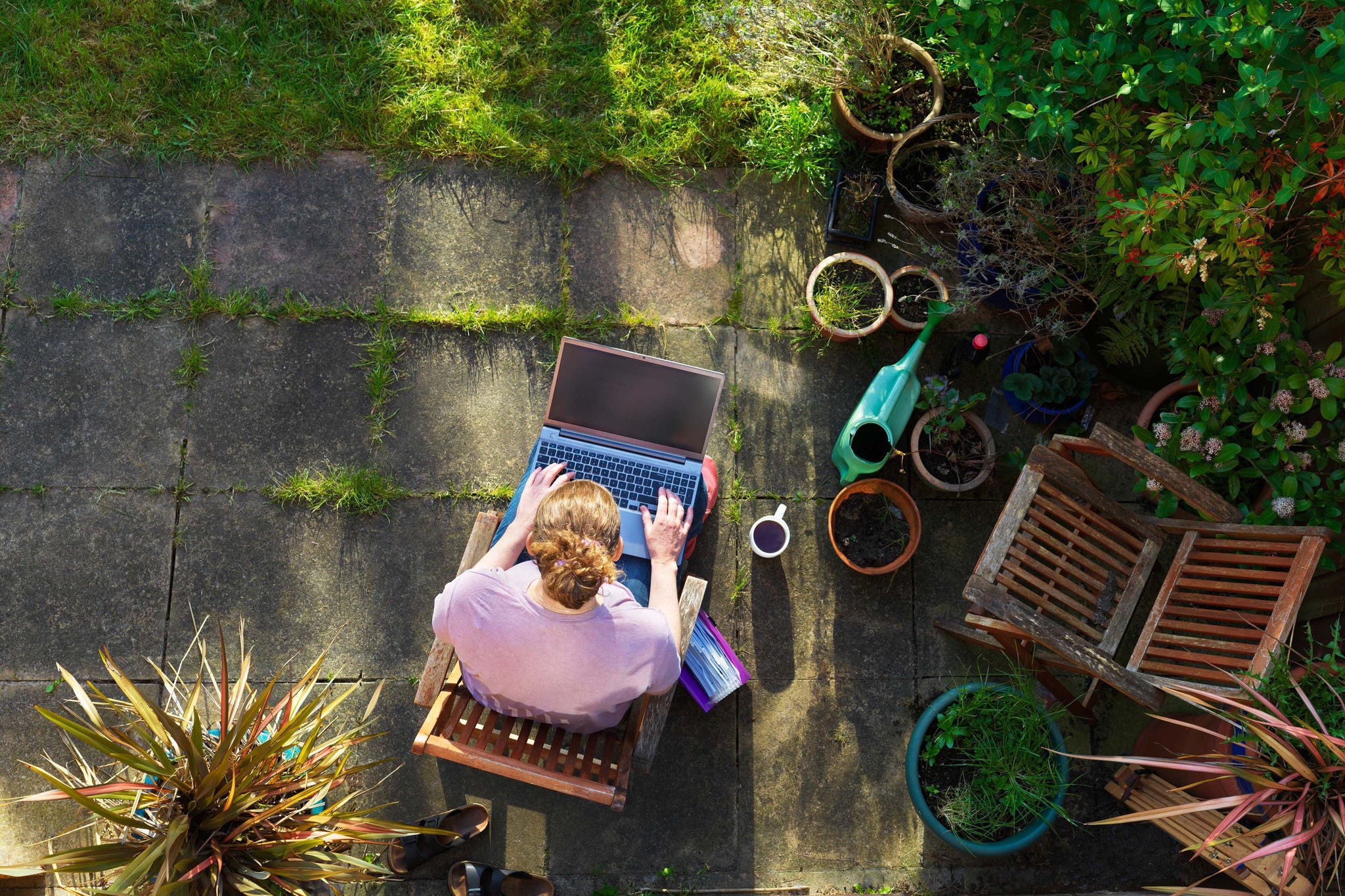 Woman working from home in her garden