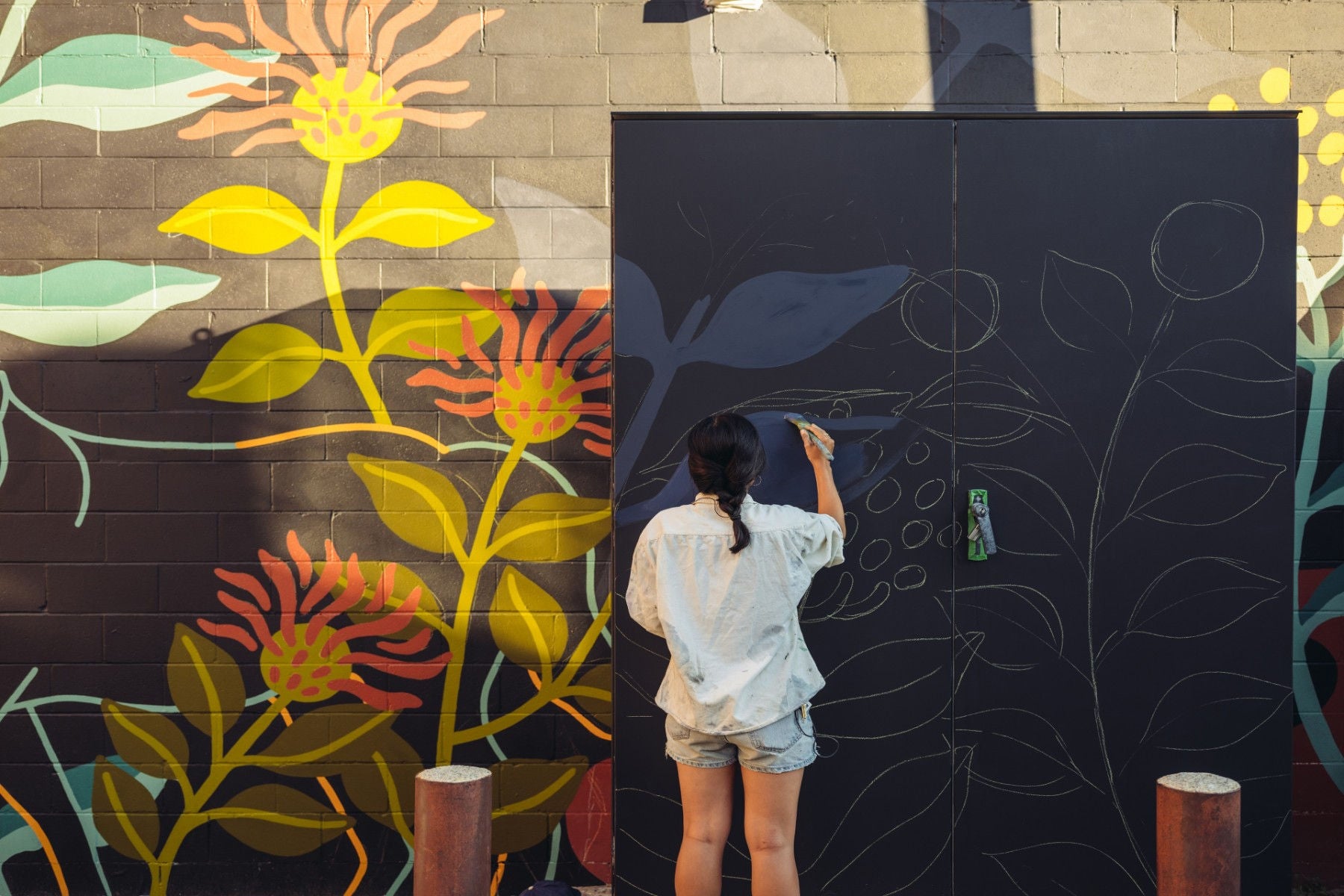 Mural artist at work