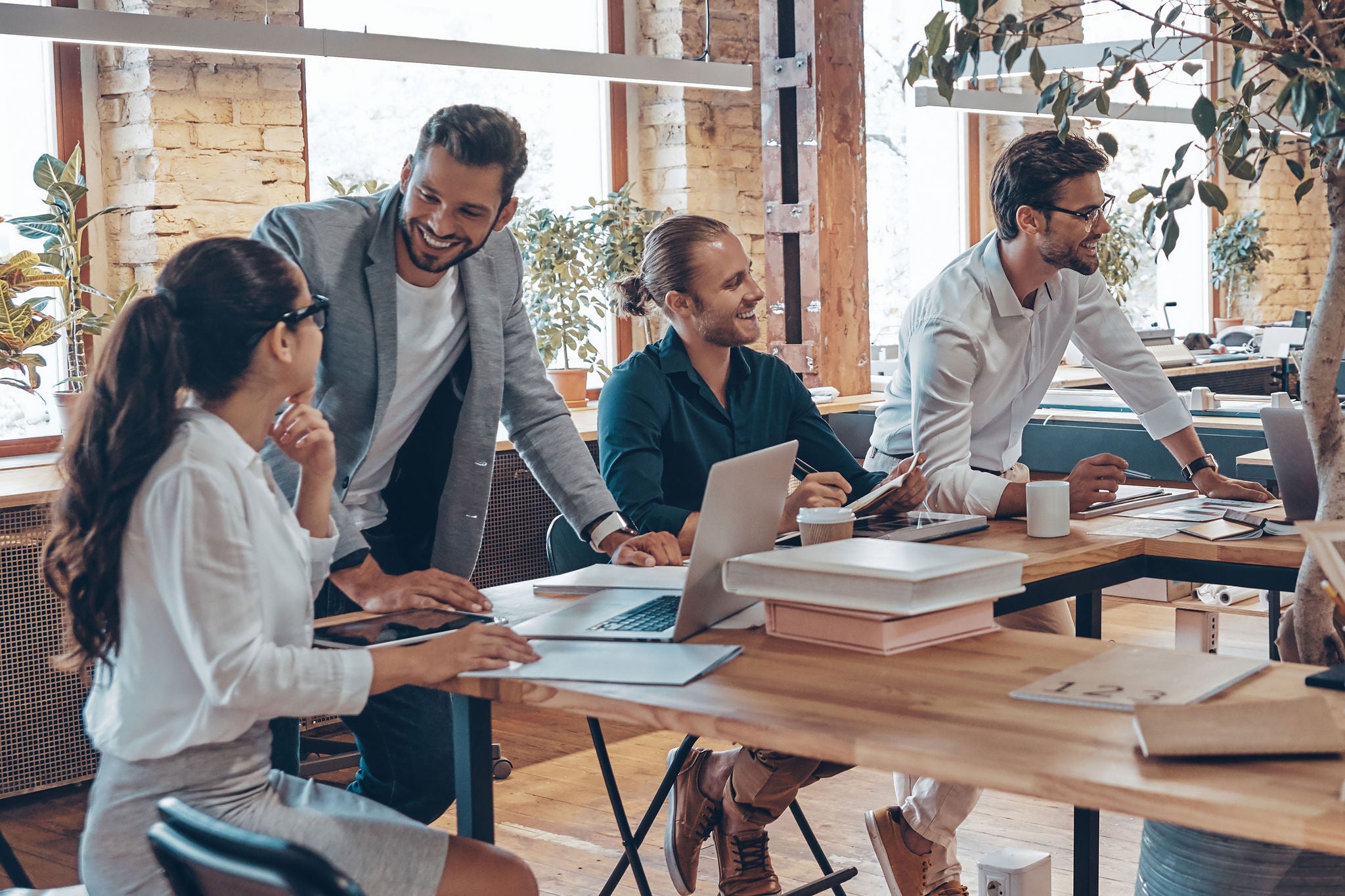 Office employees discussing about project