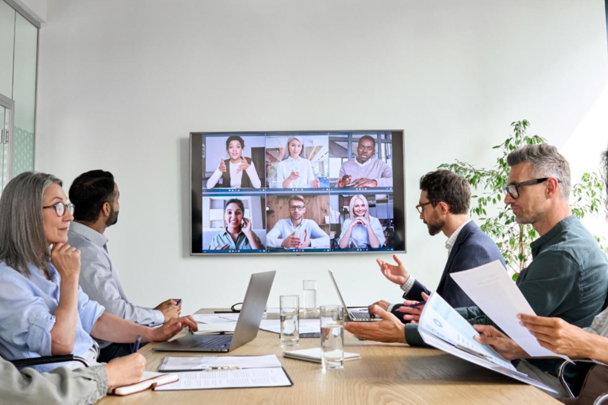 Diverse employees at a video conference call