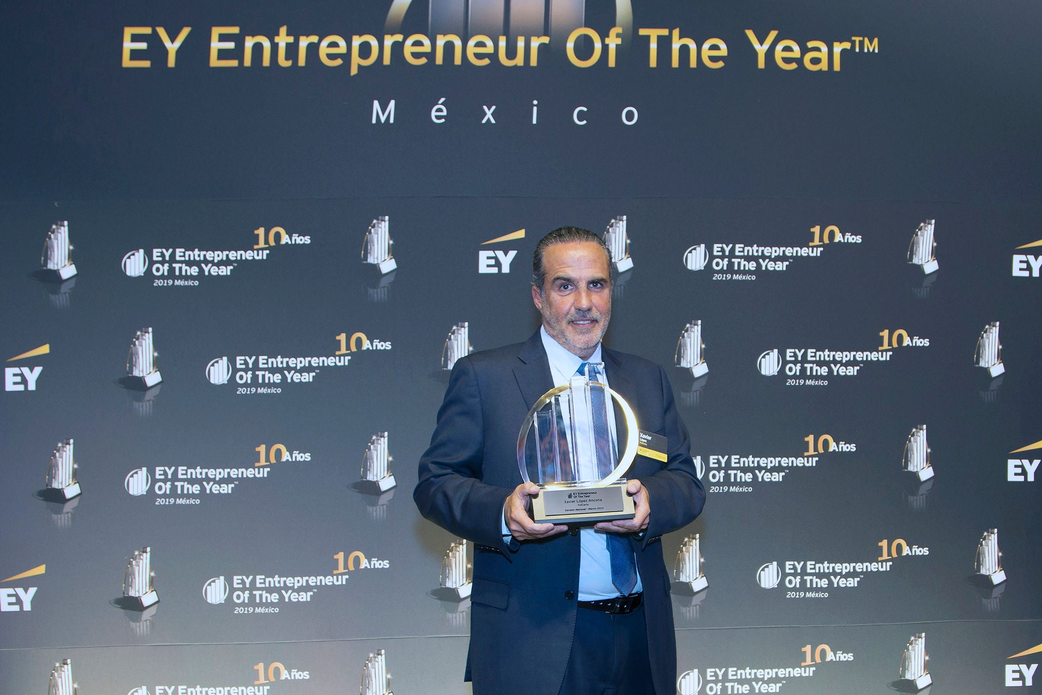 A Man with enterpreneur of the year award