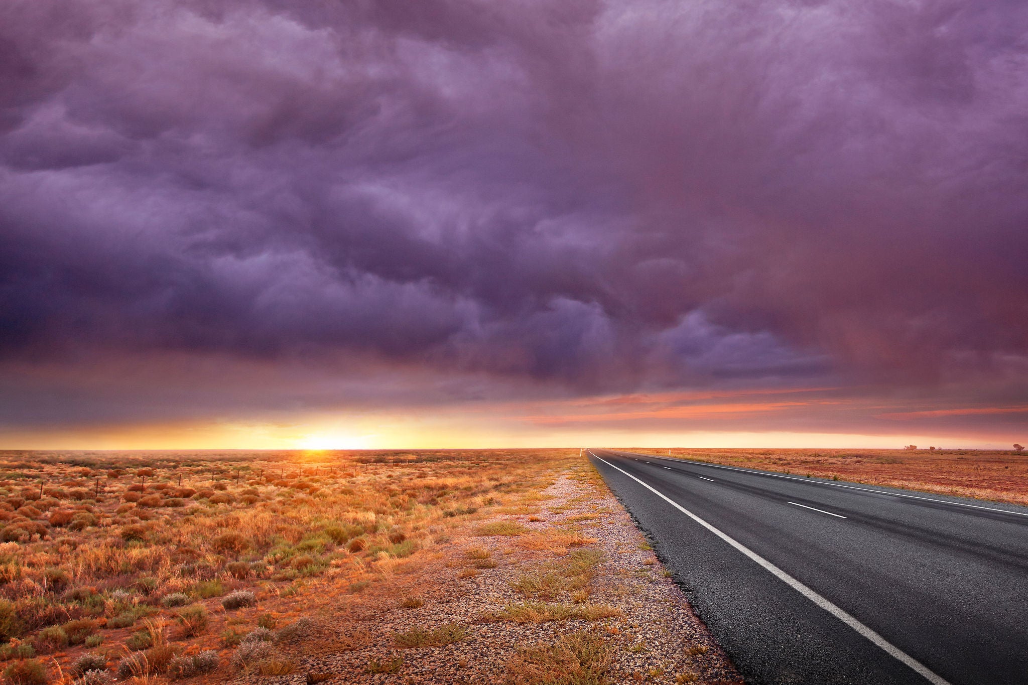 A long straight road stretches into the distance