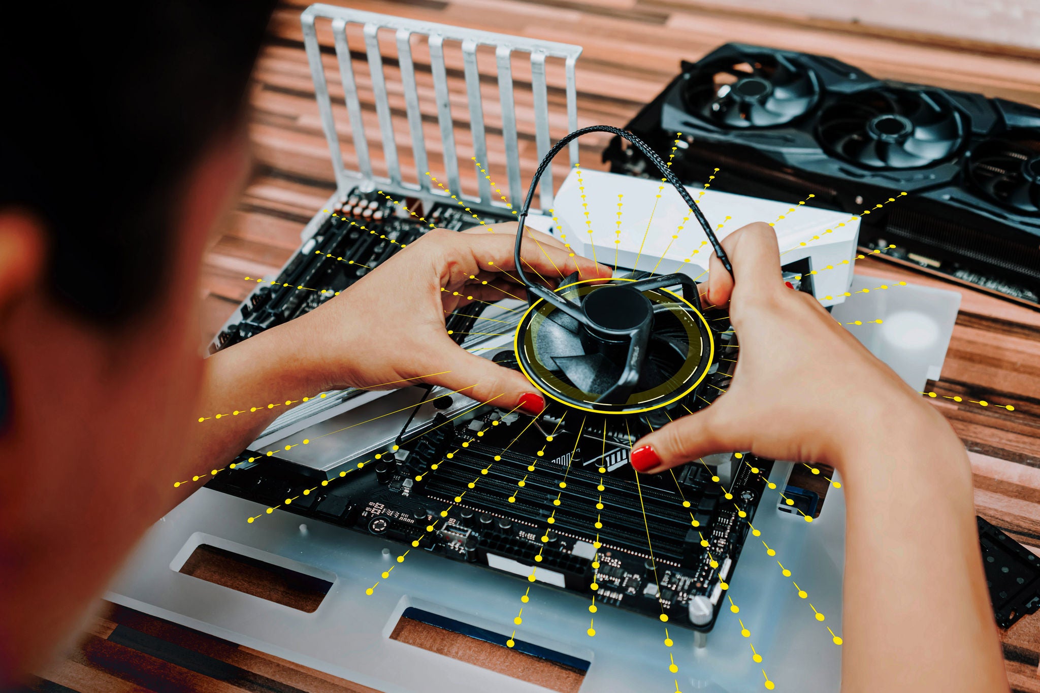 Young woman repairing and assembling pc computer