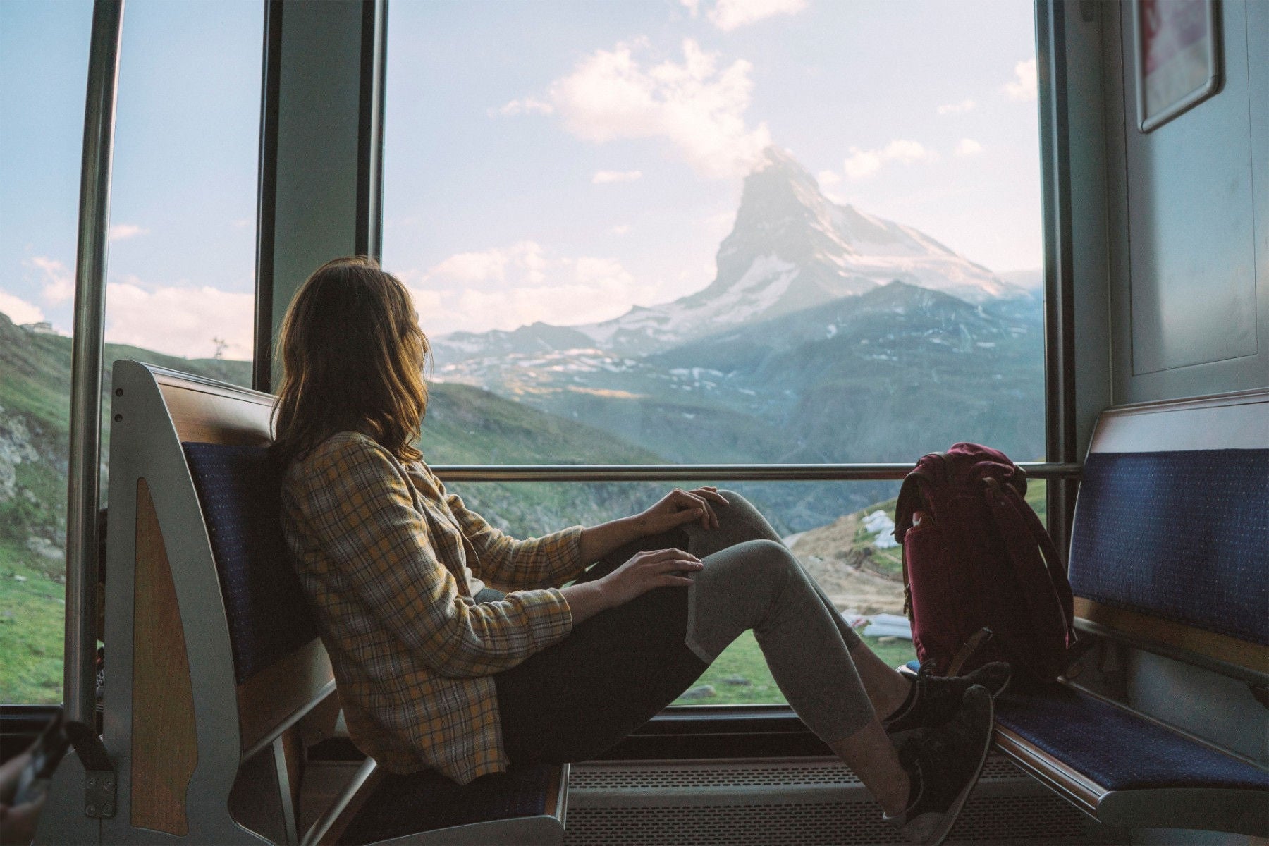 ey-woman-travelling-in-gornergrat-train