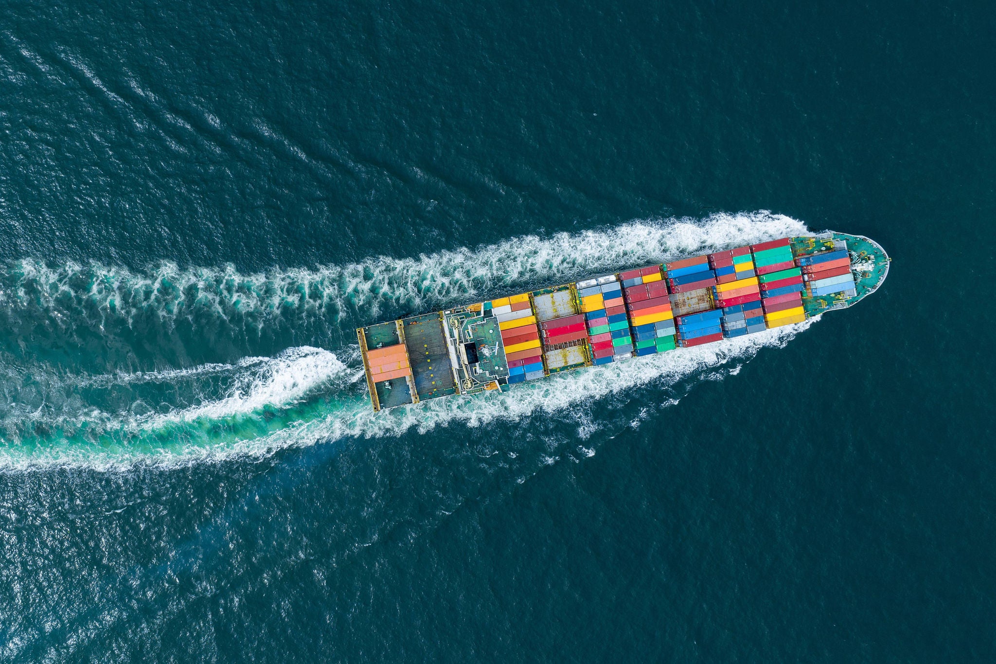 Cargo container ship top view carrying container