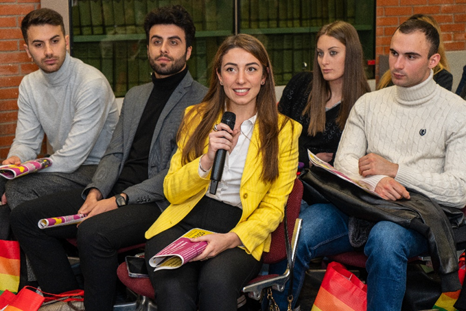 A person from audience asking a question