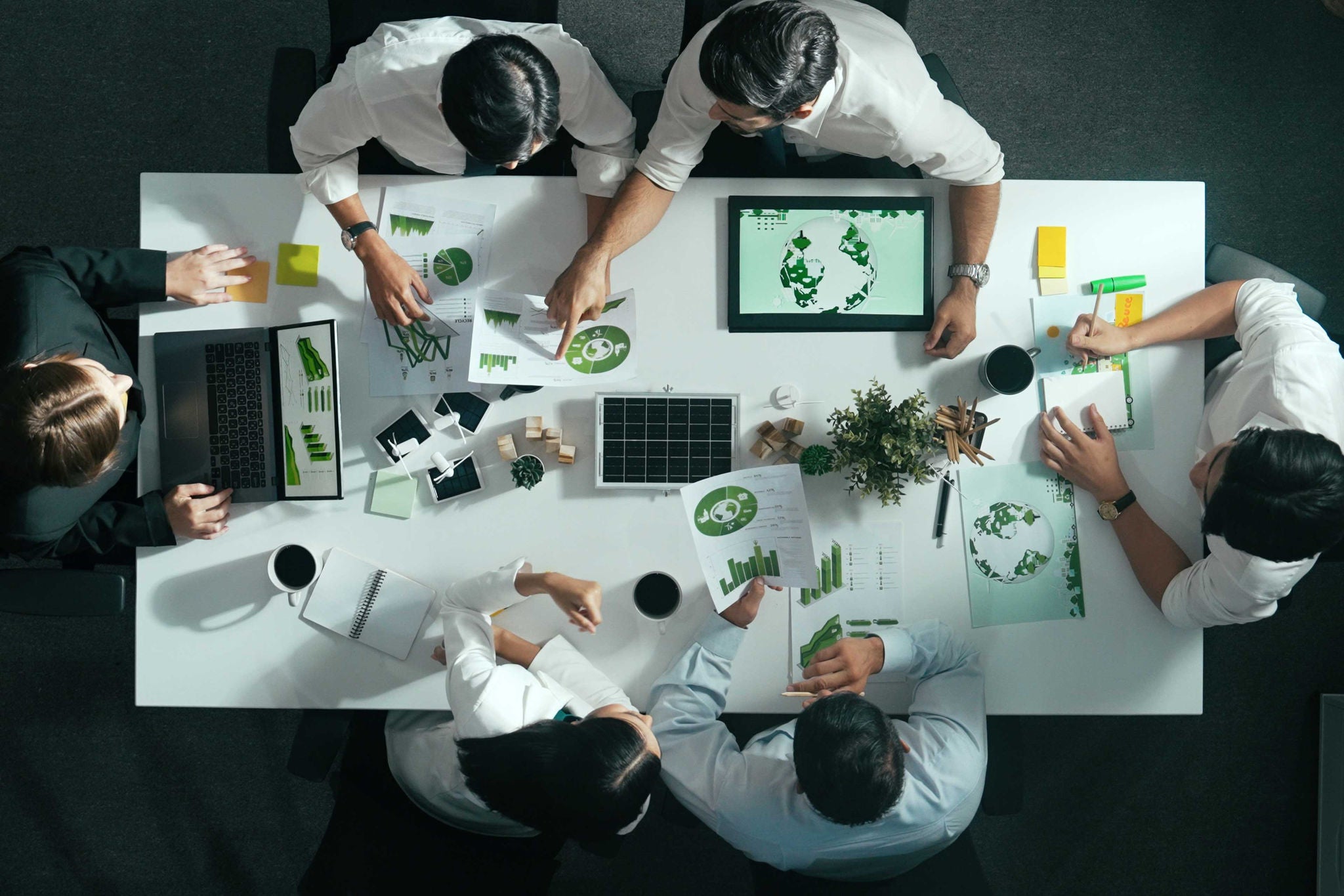 Business people having discussion on office desk