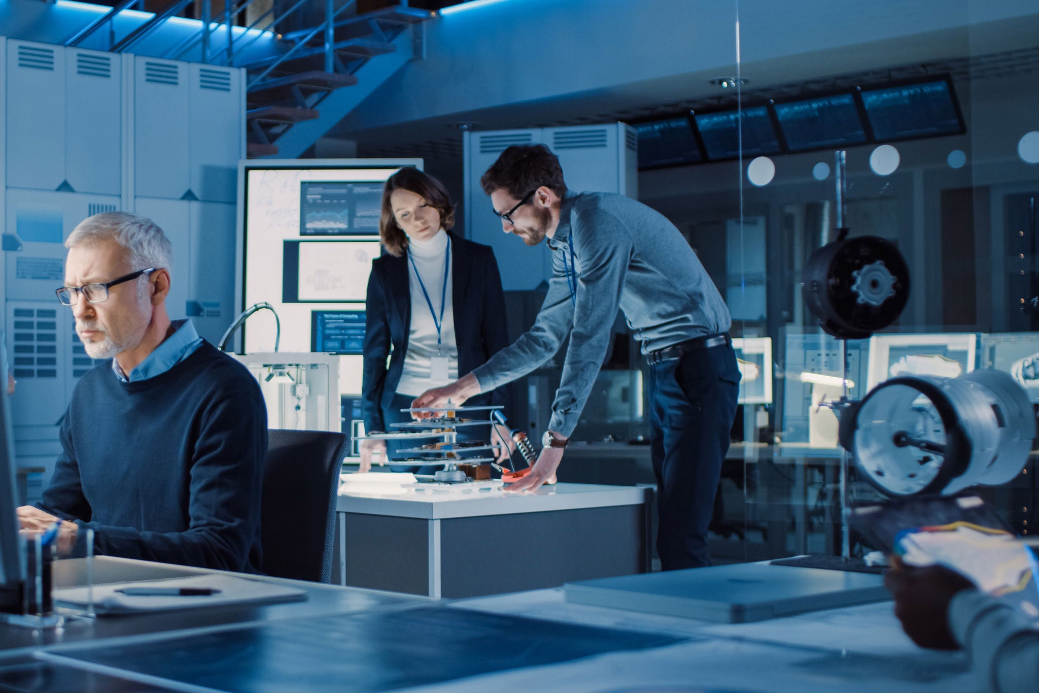 Diverse International Team of Industrial Engineers and Scientists Working in Research Laboratory and Development Center. People Working with 3D Printing, Using Computers, Designing Hardware