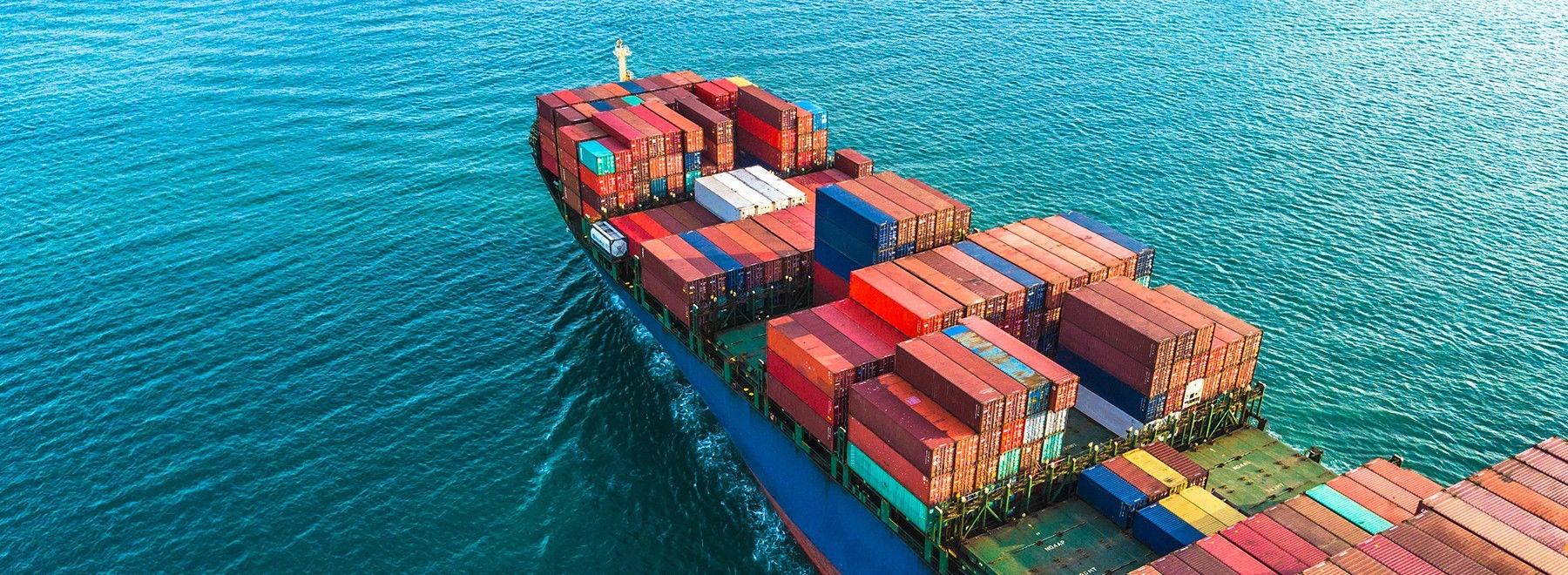 Ariel view of a boat with colorful cargo containers