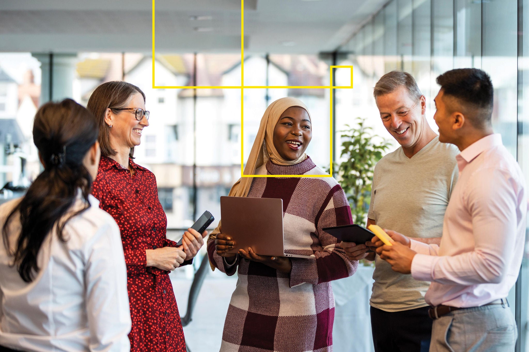 EY - Business professionals at a networking conference