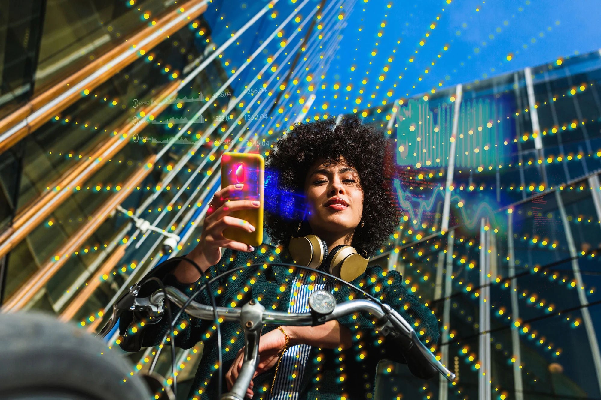 woman-using-a-mobile-and-sitting-on-a-bike