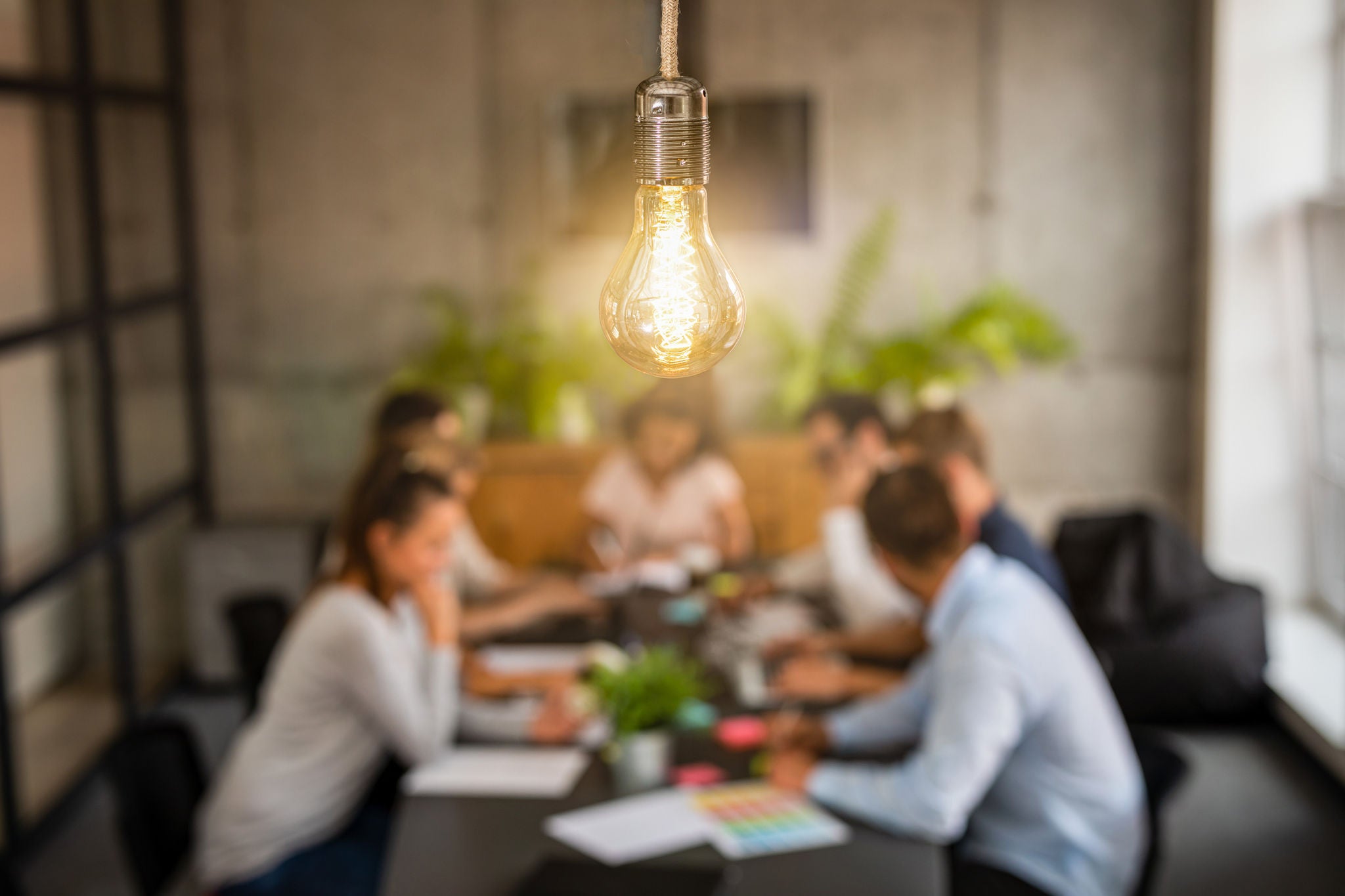 Young business people are discussing together a new startup project