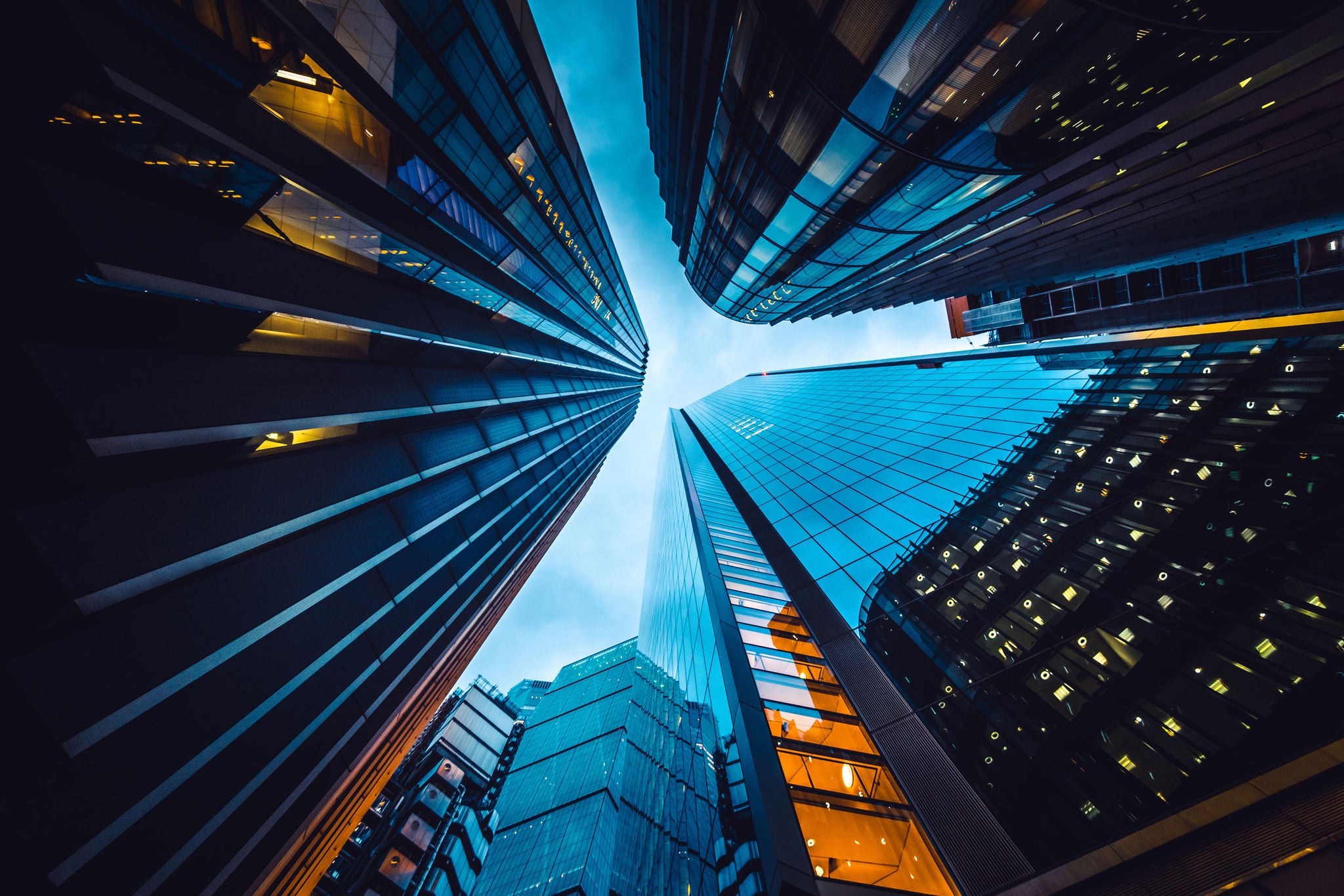 Looking directly up at the skyline of the financial district