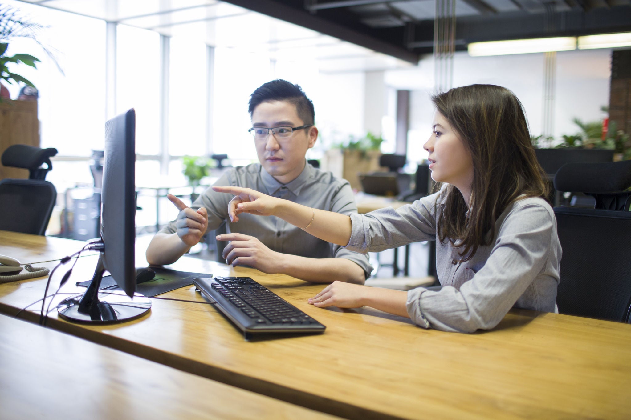 IT workers talking in office