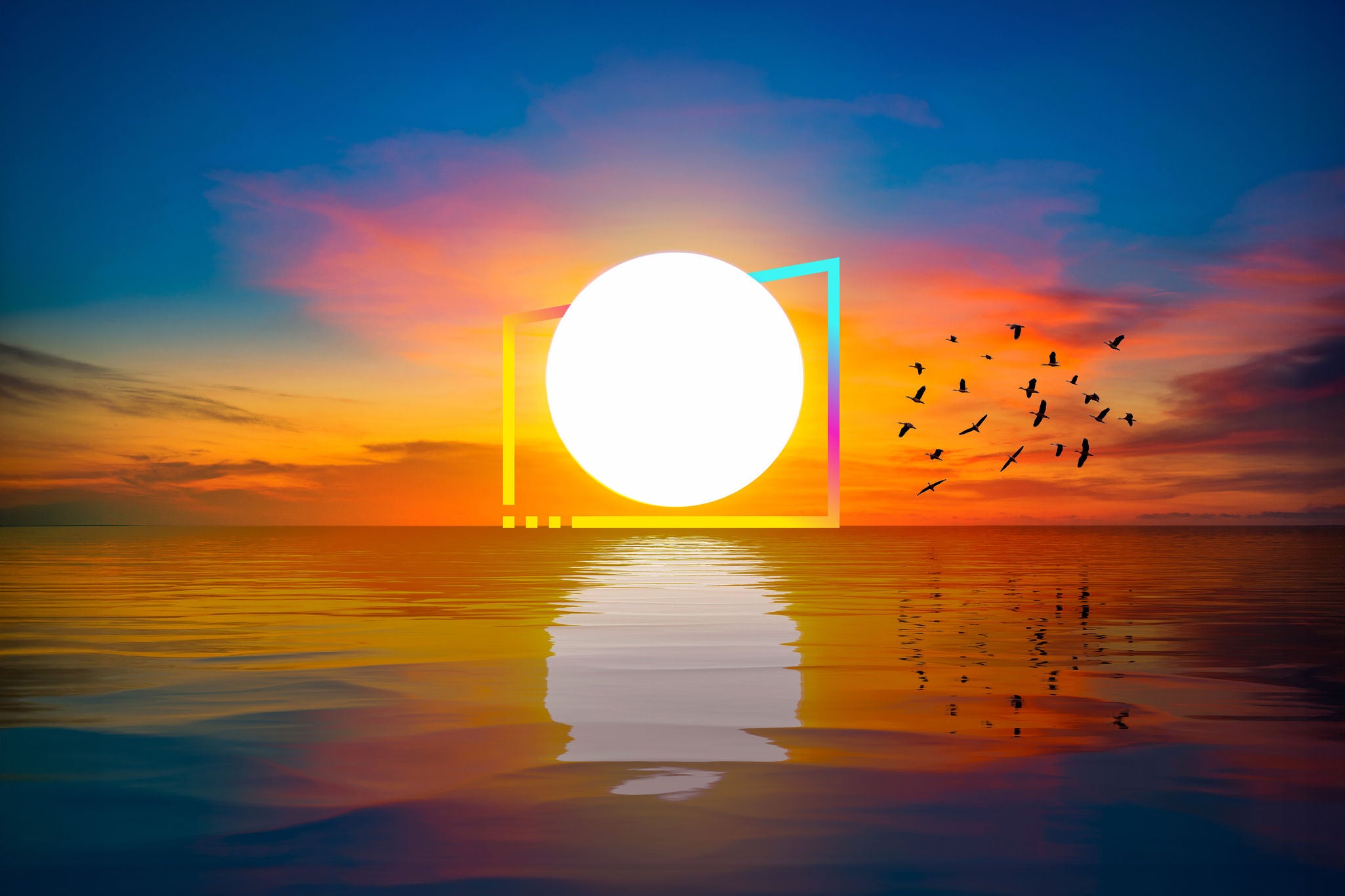 The big sun at dawn on the sea with beautiful reflections and flocks of birds in flight