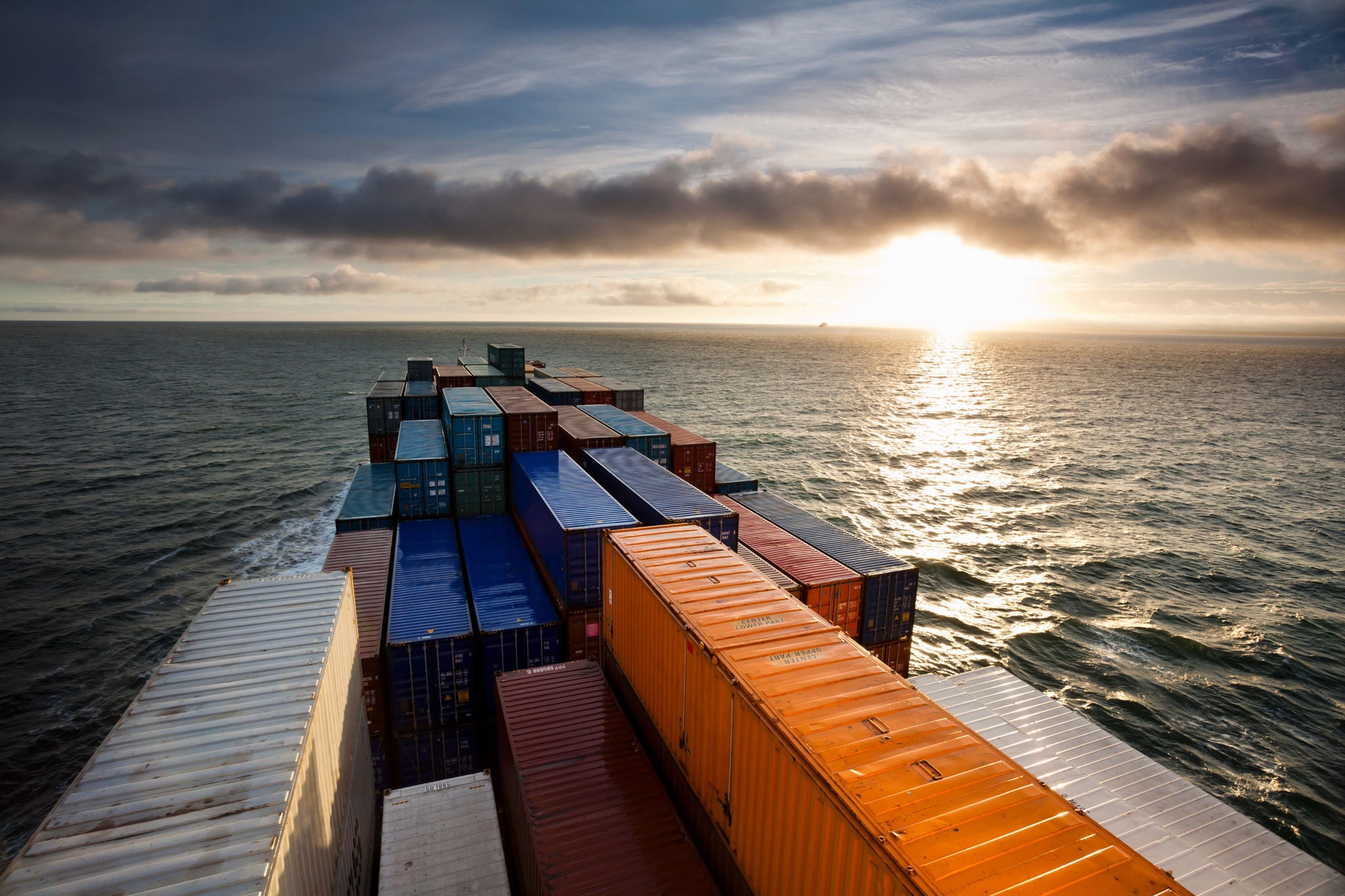 Container ship on the baltic sea at sunrise