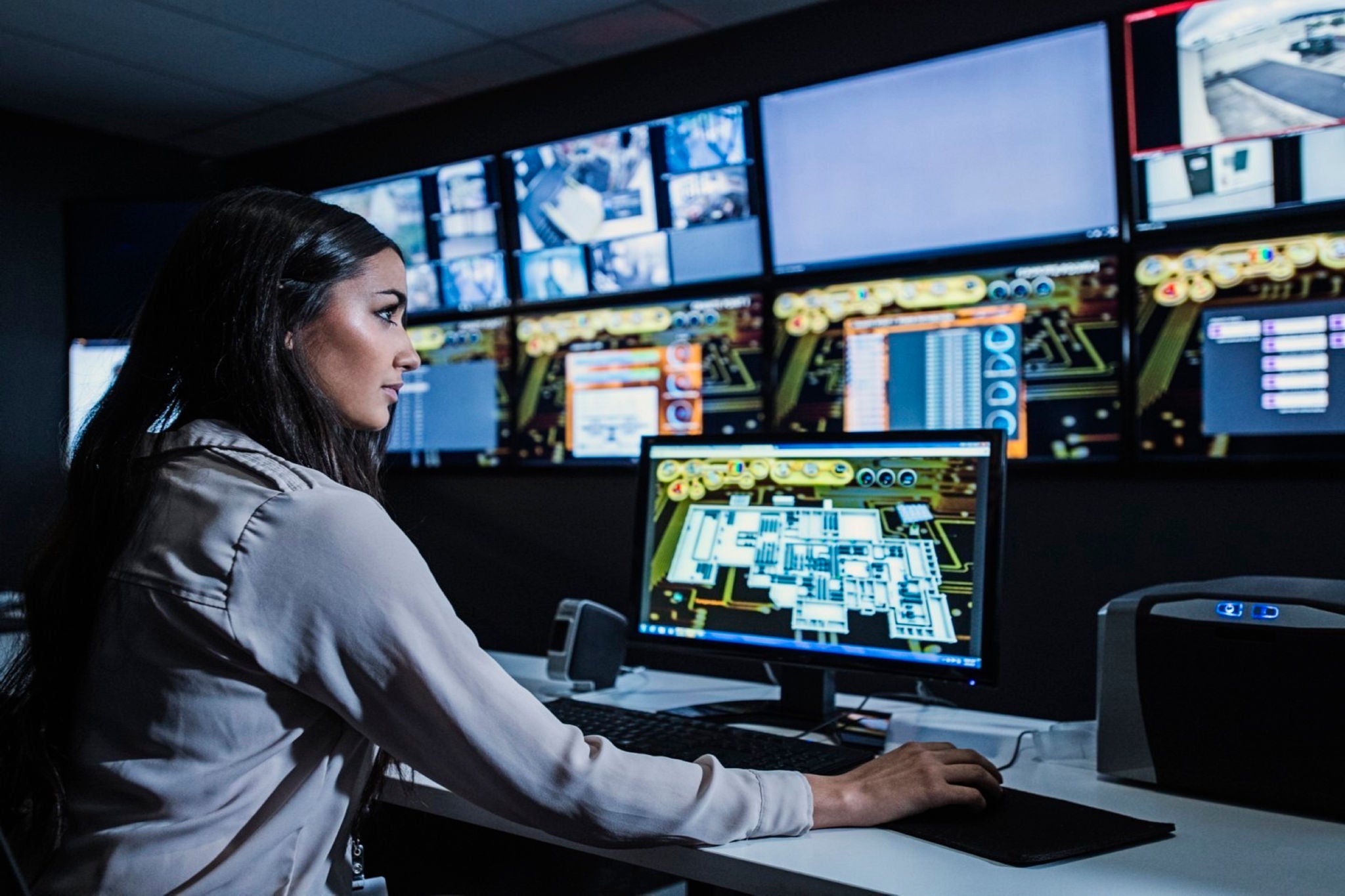 Woman employee using desktop