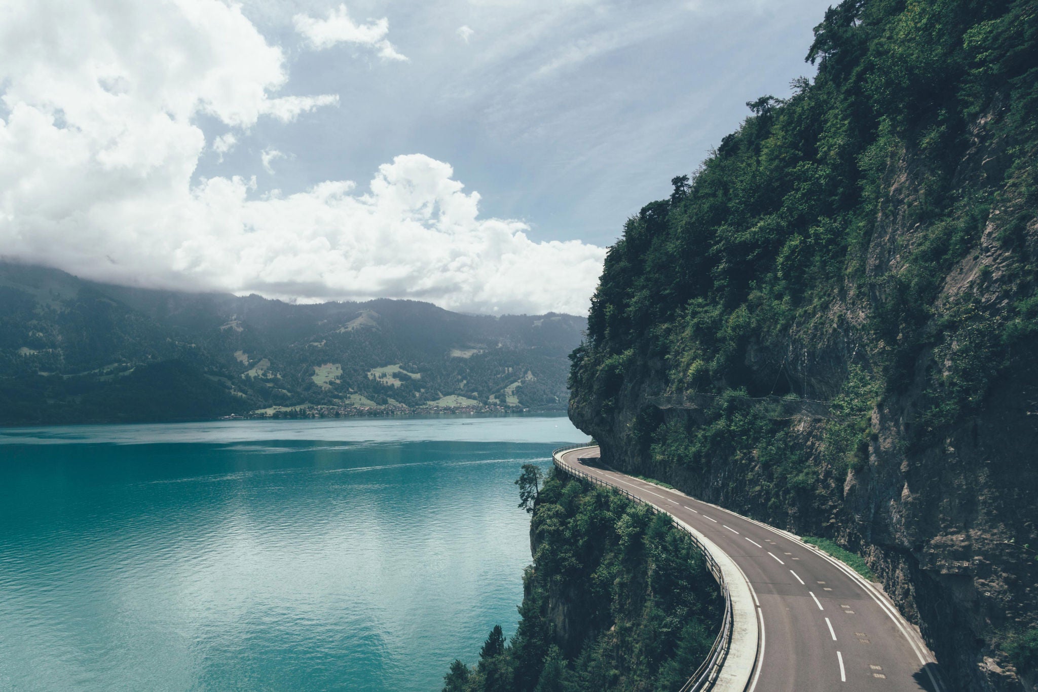 COUNTRY ROAD PASSING THROUGH MOUNTAINS