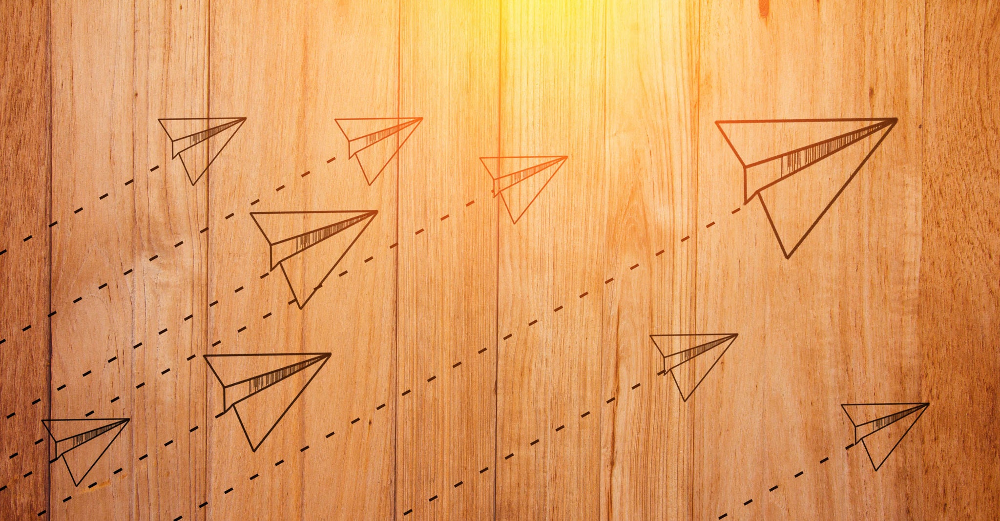 Rocket paper doodleon wooden background