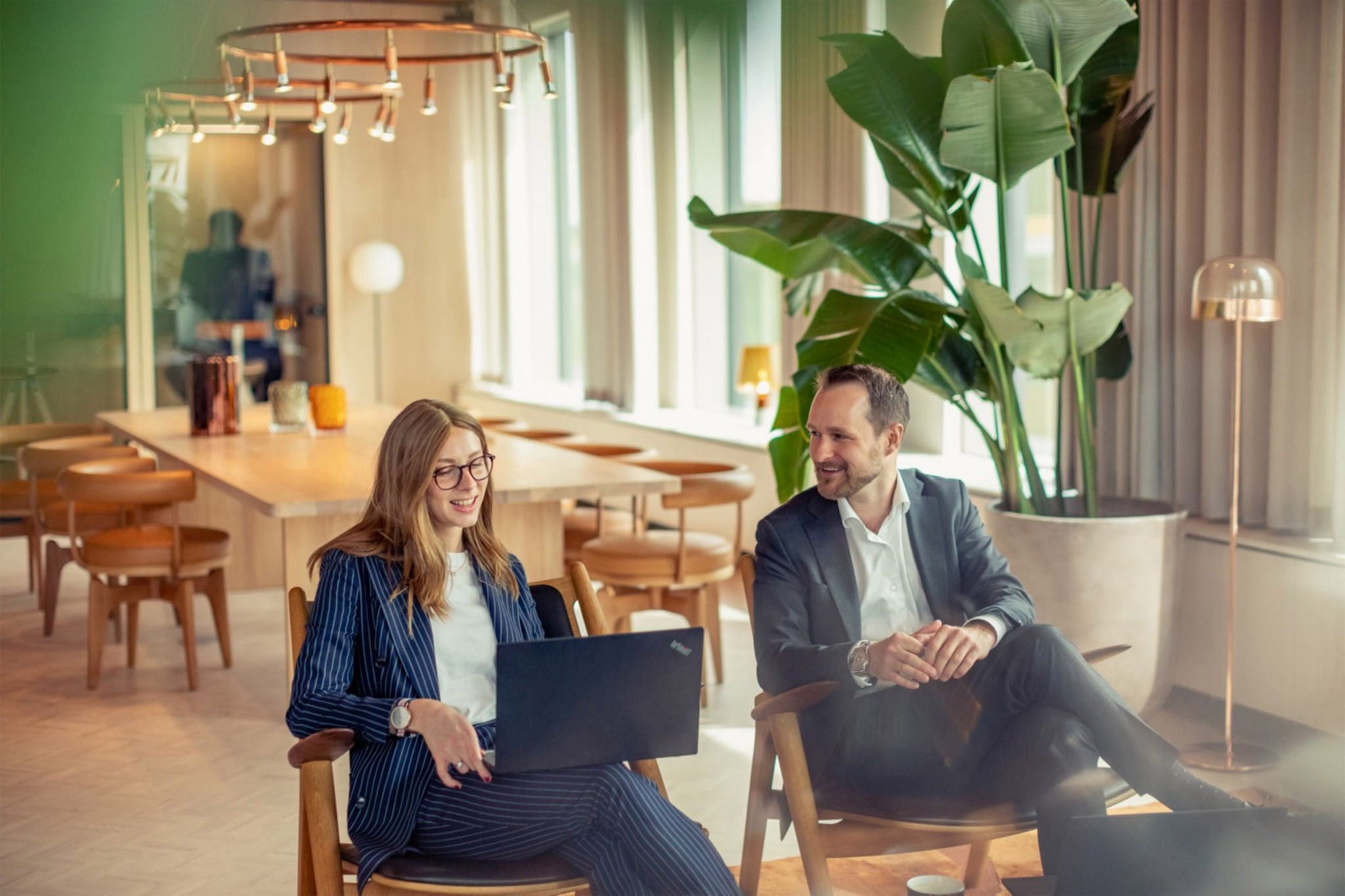 Johan Brobert having a conversation with his colleague