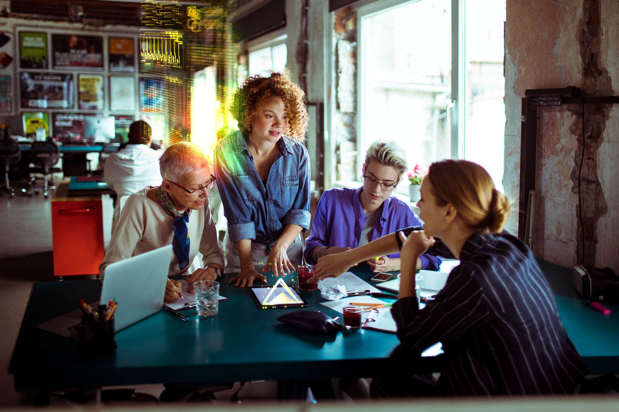 Women working on green table